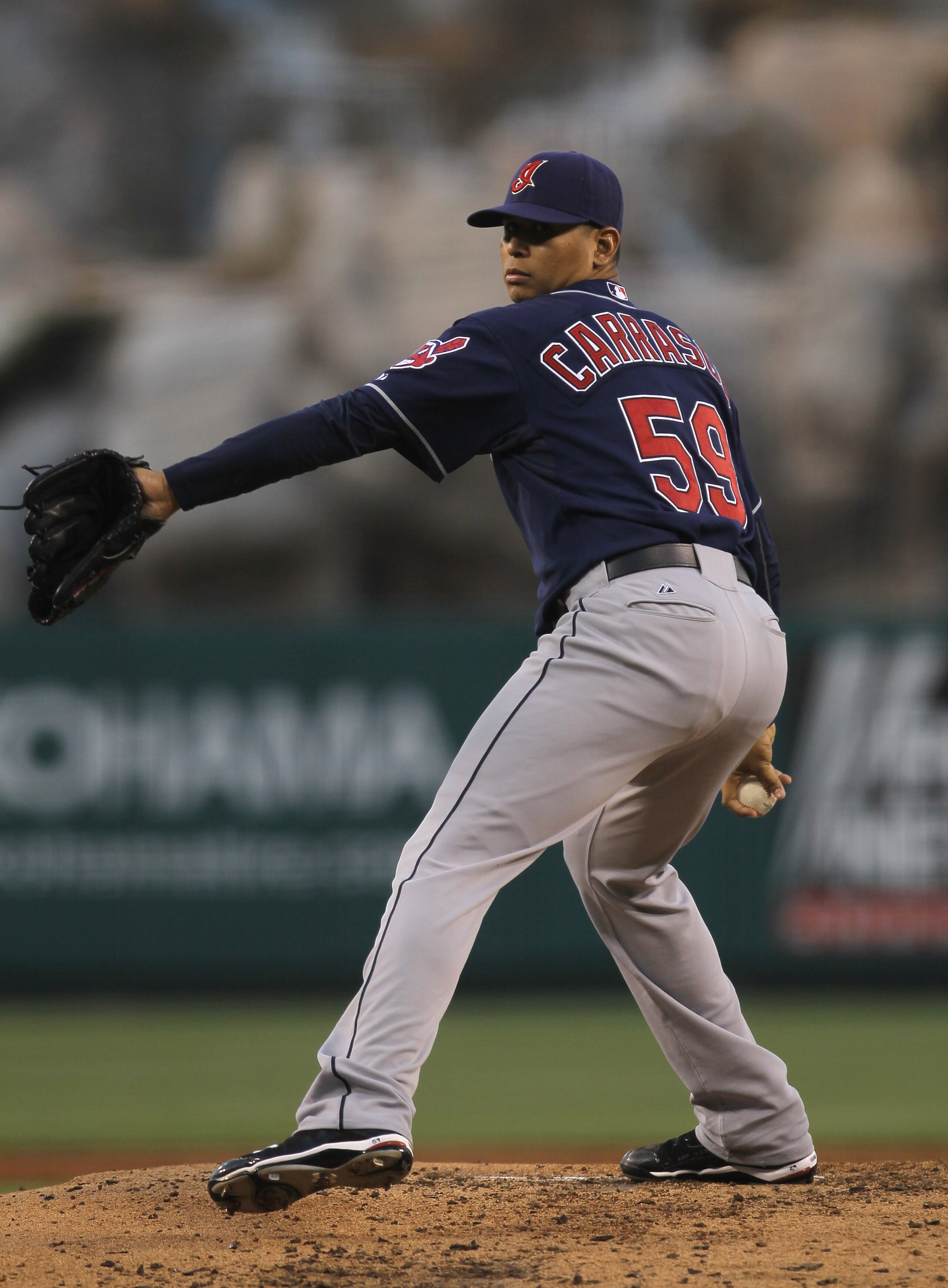 ANAHEIM, CA - SEPTEMBER 06:  Carlos Carrasco #59 of the Cleveland Indians throws a pitch against the Los Angeles Angels of Anaheim on September 6, 2010 at Angel Stadium in Anaheim, California.  (Photo by Stephen Dunn/Getty Images)