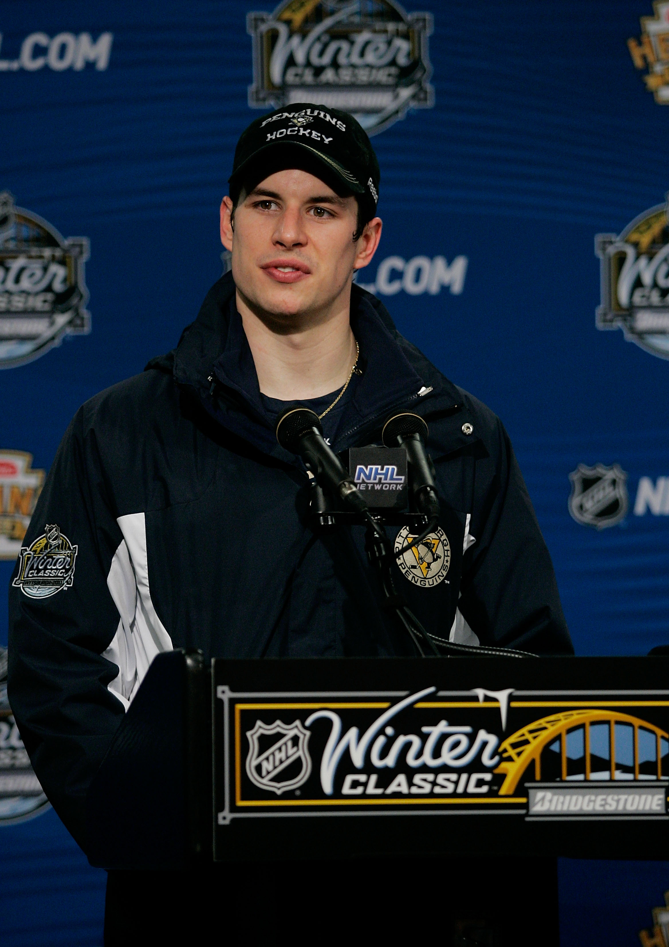 PITTSBURGH, PA - JANUARY 01: Sidney Crosby #87 of the Pittsburgh Penguins talks to the media during a press conference after losing 3-1 to the Washington Capitals during the 2011 NHL Bridgestone Winter Classic at Heinz Field on January 1, 2011 in Pittsbur
