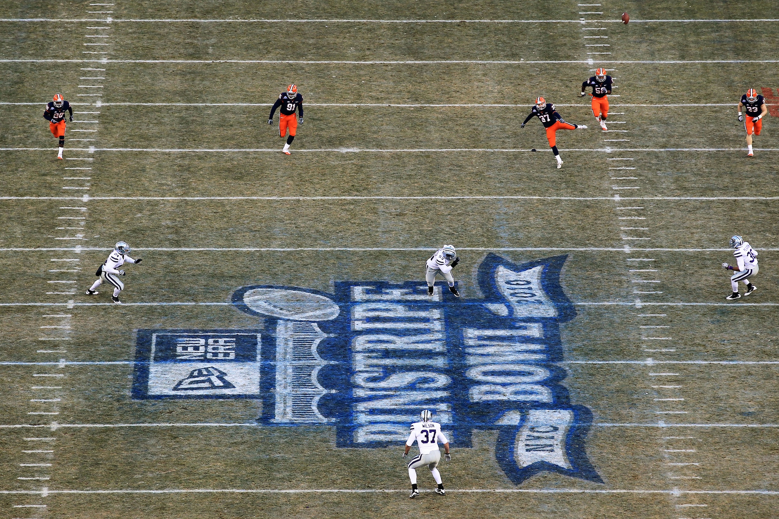 NEW YORK, NY - DECEMBER 30:  Ross Krautman #37 of the Syracuse Orange kicks off against the Kansas State Wildcats during the New Era Pinstripe Bowl at Yankee Stadium on December 30, 2010 in New York, New York.  (Photo by Chris McGrath/Getty Images)