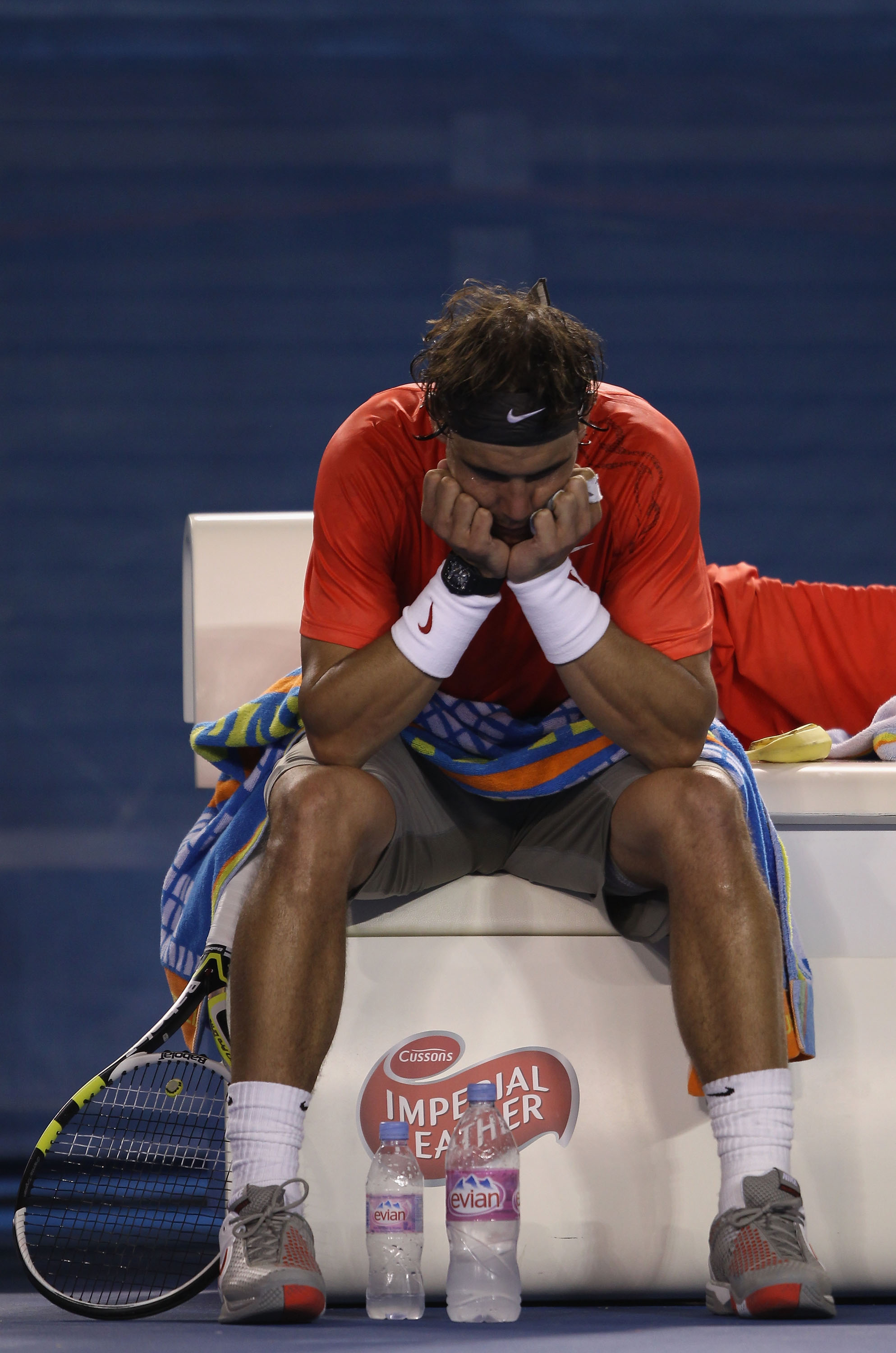 MELBOURNE, AUSTRALIA - JANUARY 26: Rafael Nadal of Spain shows his emotions betweein games in his quarterfinal match against David Ferrer of Spain during day ten of the 2011 Australian Open at Melbourne Park on January 26, 2011 in Melbourne, Australia.