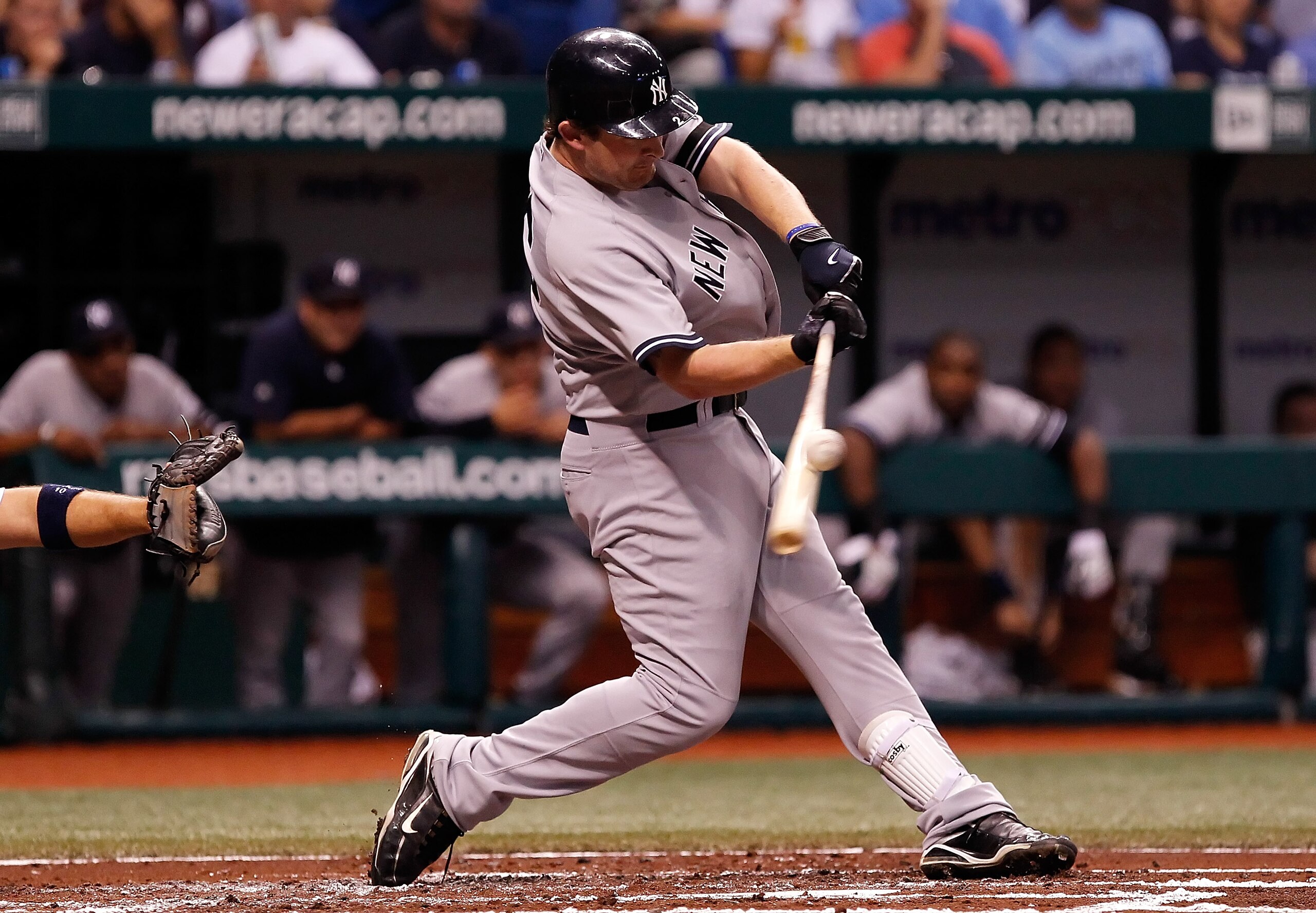 ST. PETERSBURG - SEPTEMBER 13:  Austin Kearns #26 of the New York Yankees fouls off a pitch against the Tampa Bay Rays during the game at Tropicana Field on September 13, 2010 in St. Petersburg, Florida.  (Photo by J. Meric/Getty Images)