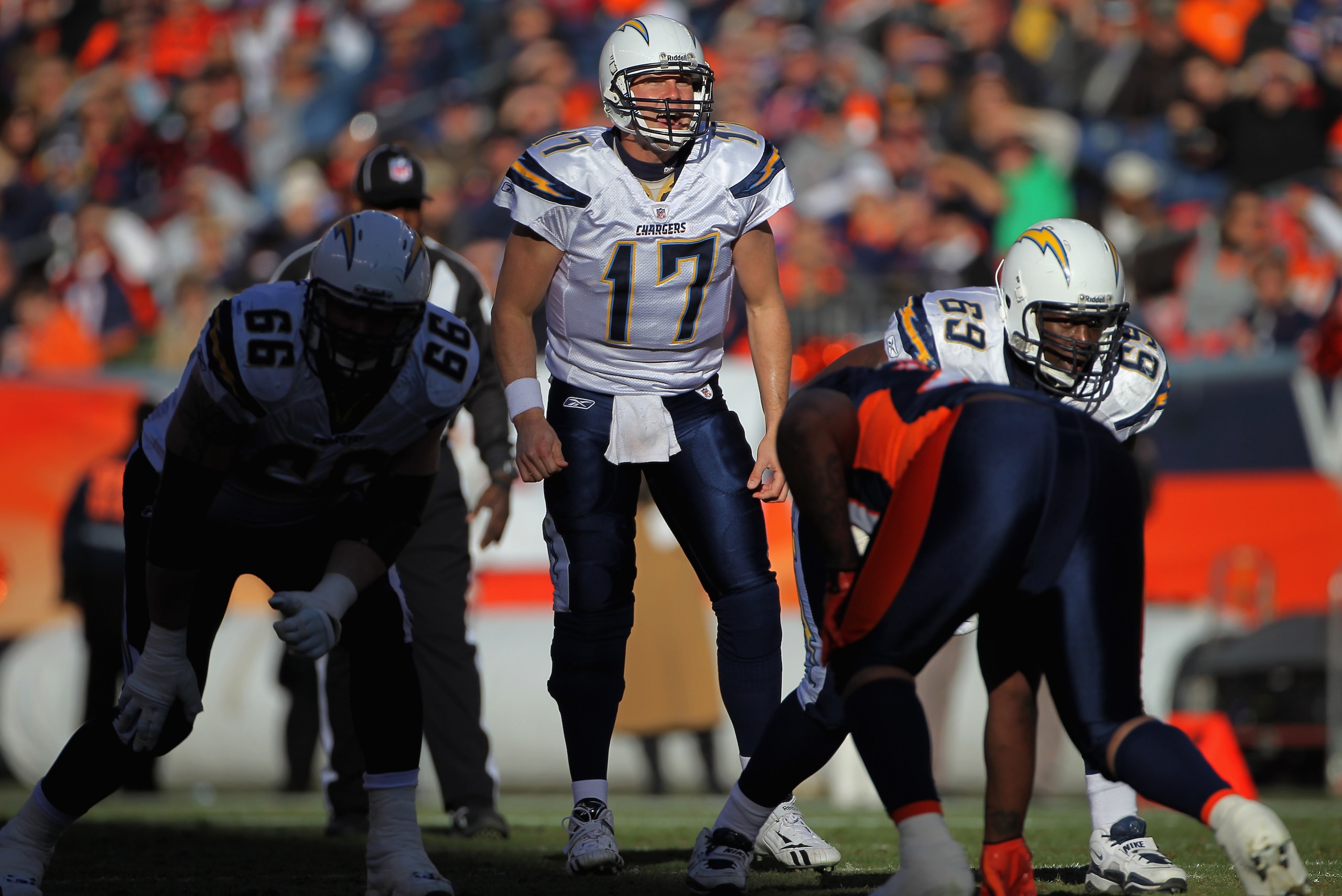 DENVER - JANUARY 02: Quarterback Philip Rivers #17 of the San Diego Chargers runs the offense against the Denver Broncos at INVESCO Field at Mile High on January 2, 2011 in Denver, Colorado. The Chargers defeated the Broncos 33-28. (Photo by Doug Pensin DENVER - JANUARY 02: Quarterback Philip Rivers #17 of the San Diego Chargers runs the offense against the Denver Broncos at INVESCO Field at Mile High on January 2, 2011 in Denver, Colorado. The Chargers defeated the Broncos 33-28. (Photo by Doug Pensin