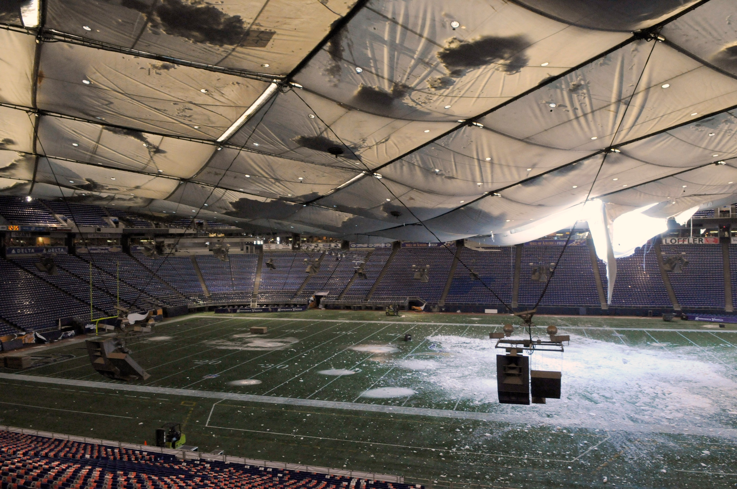 MINNEAPOLIS, MN - DECEMBER 13: A torn section of the roof sags inside the Hubert H. Humphrey Metrodome on December 13, 2010 in Minneapolis, Minnesota. The Metrodome's roof collapsed under the weight of snow after a powerful blizzard hit the area on Decemb MINNEAPOLIS, MN - DECEMBER 13: A torn section of the roof sags inside the Hubert H. Humphrey Metrodome on December 13, 2010 in Minneapolis, Minnesota. The Metrodome's roof collapsed under the weight of snow after a powerful blizzard hit the area on Decemb