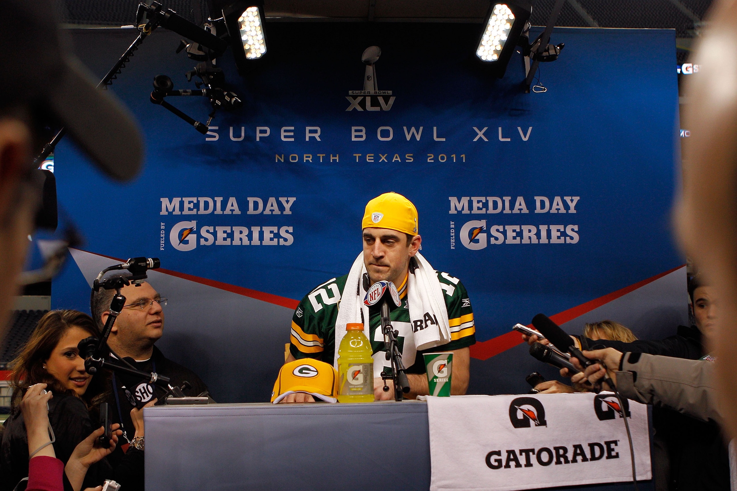 ARLINGTON, TX - FEBRUARY 01:  Quarterback Aaron Rodgers #12 of the Green Bay Packers speaks during Super Bowl XLV Media Day ahead of Super Bowl XLV at Cowboys Stadium on February 1, 2011 in Arlington, Texas. The Pittsburgh Steelers will play the Green Bay
