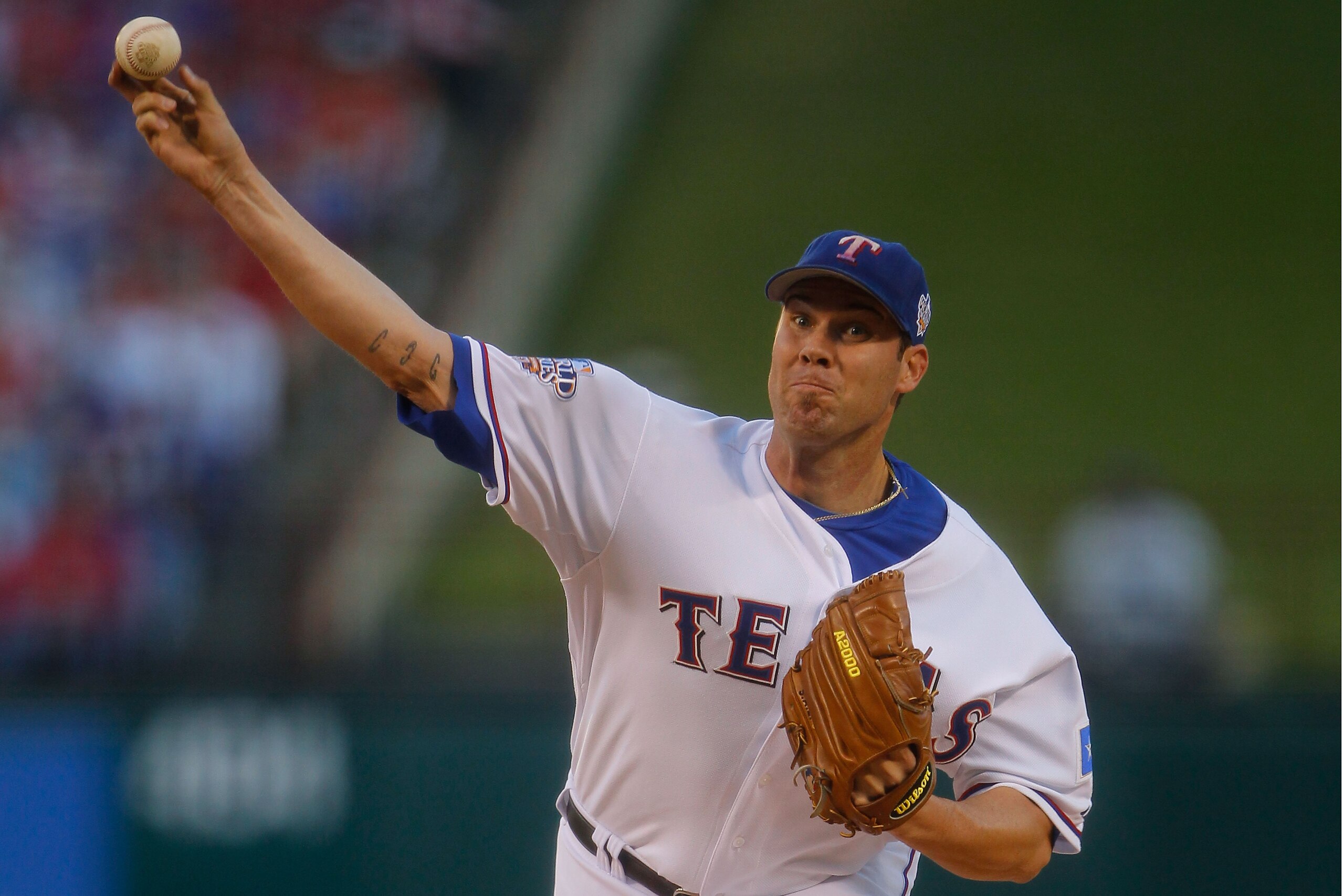 ARLINGTON, TX - OCTOBER 30: Starting pitcher Colby Lewis #48 of the Texas Rangers pitches against the San Francisco Giants in Game Three of the 2010 MLB World Series at Rangers Ballpark in Arlington on October 30, 2010 in Arlington, Texas. (Photo by Bri ARLINGTON, TX - OCTOBER 30: Starting pitcher Colby Lewis #48 of the Texas Rangers pitches against the San Francisco Giants in Game Three of the 2010 MLB World Series at Rangers Ballpark in Arlington on October 30, 2010 in Arlington, Texas. (Photo by Bri