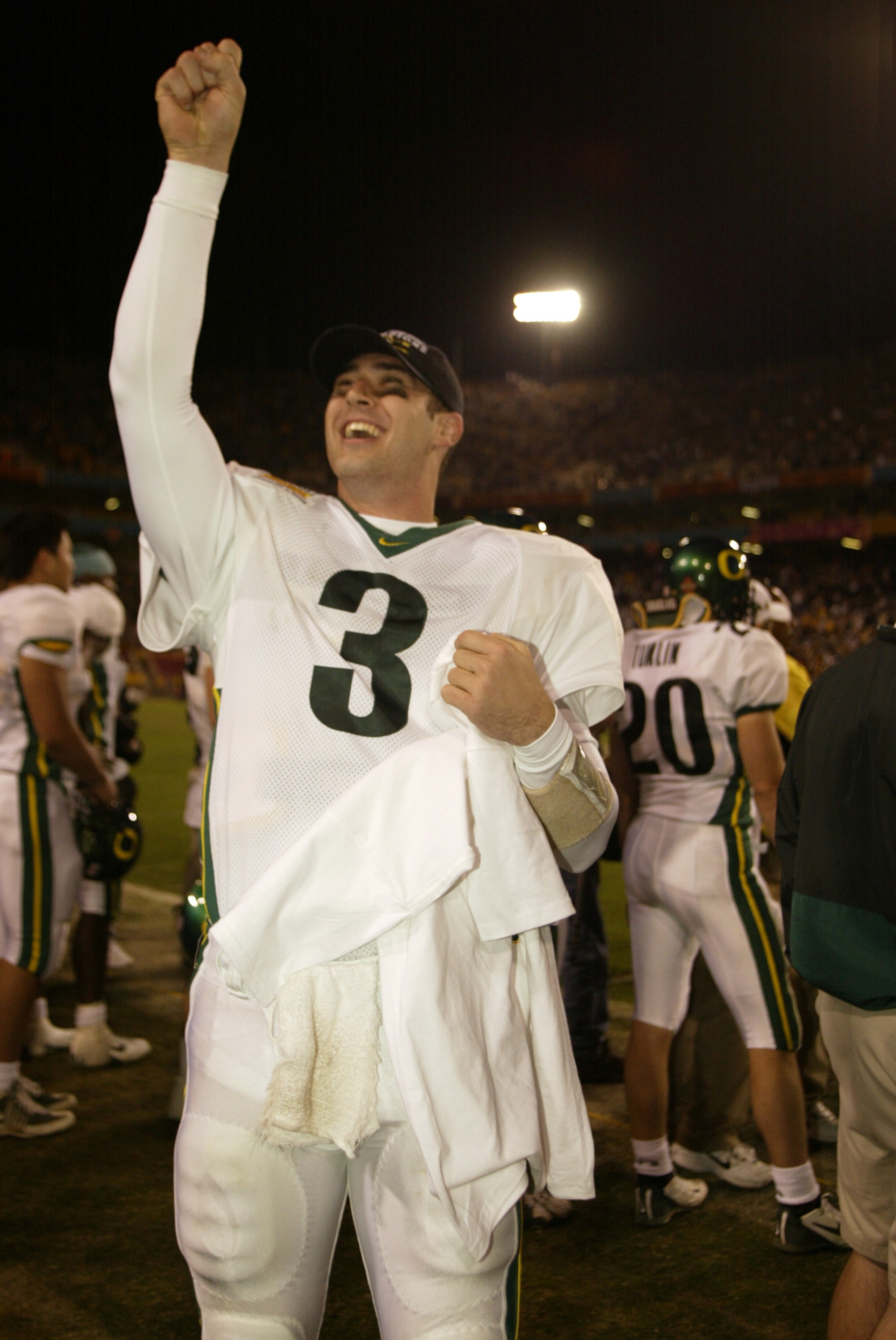 01 Jan 2002 : Joey Harrington of Oregon celebrates after the game against Colorado at the  Fiesta Bowl at Sun Devil Stadium in Tempe, Arizona. The Oregon Ducks won 38-16. DIGITAL IMAGE. Mandatory Credit: Brian Bahr/Getty Images