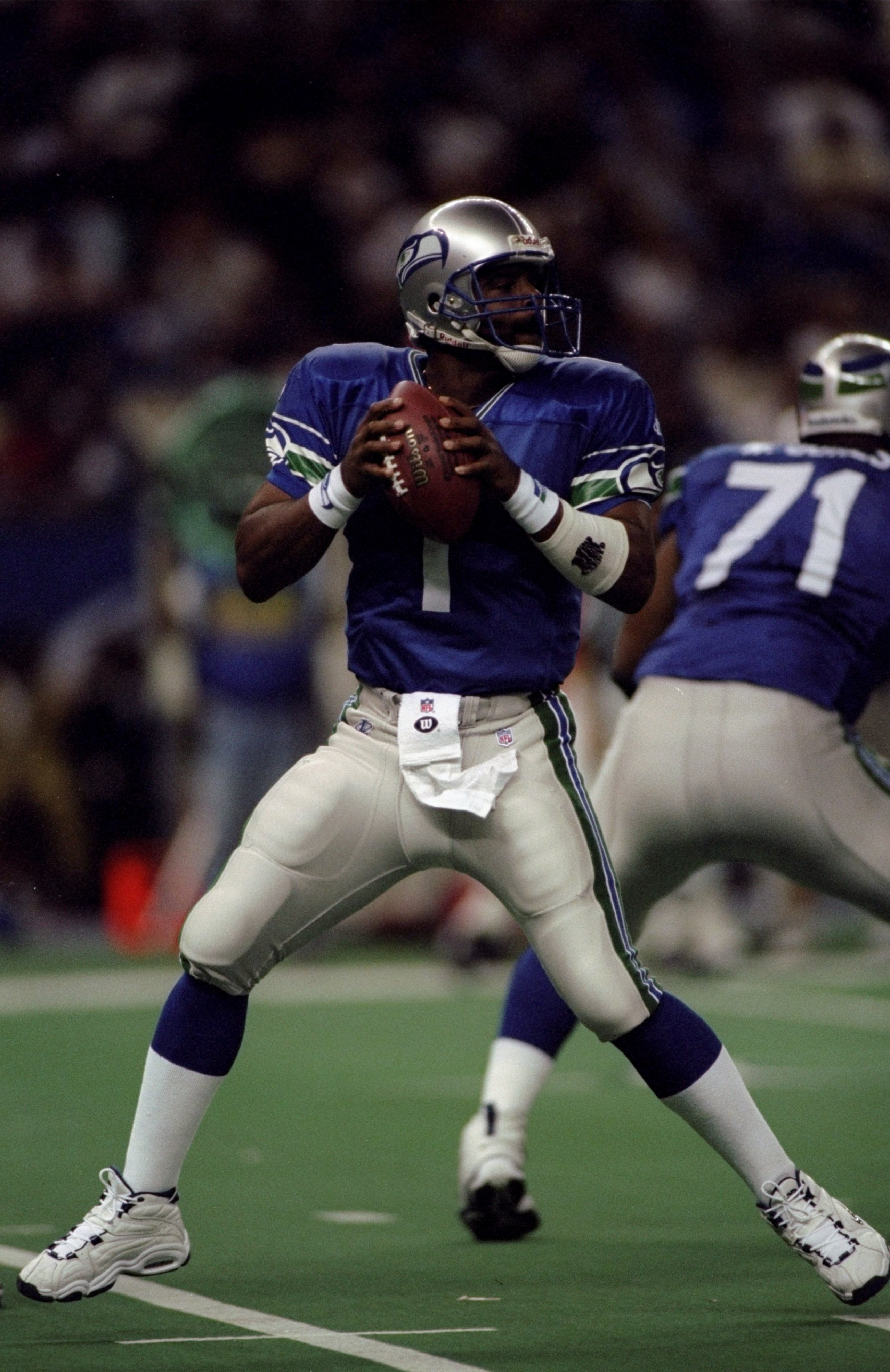 20 Sep 1998:  Quarterback  Warren Moon #1 of the Seattle Seahawks steps back to throw during a game against the Washington Redskins at the Kingdome in Seattle, Washington. The Seahawks defeated the Redskins 24-14. Mandatory Credit: Otto Greule Jr.  /Allsp