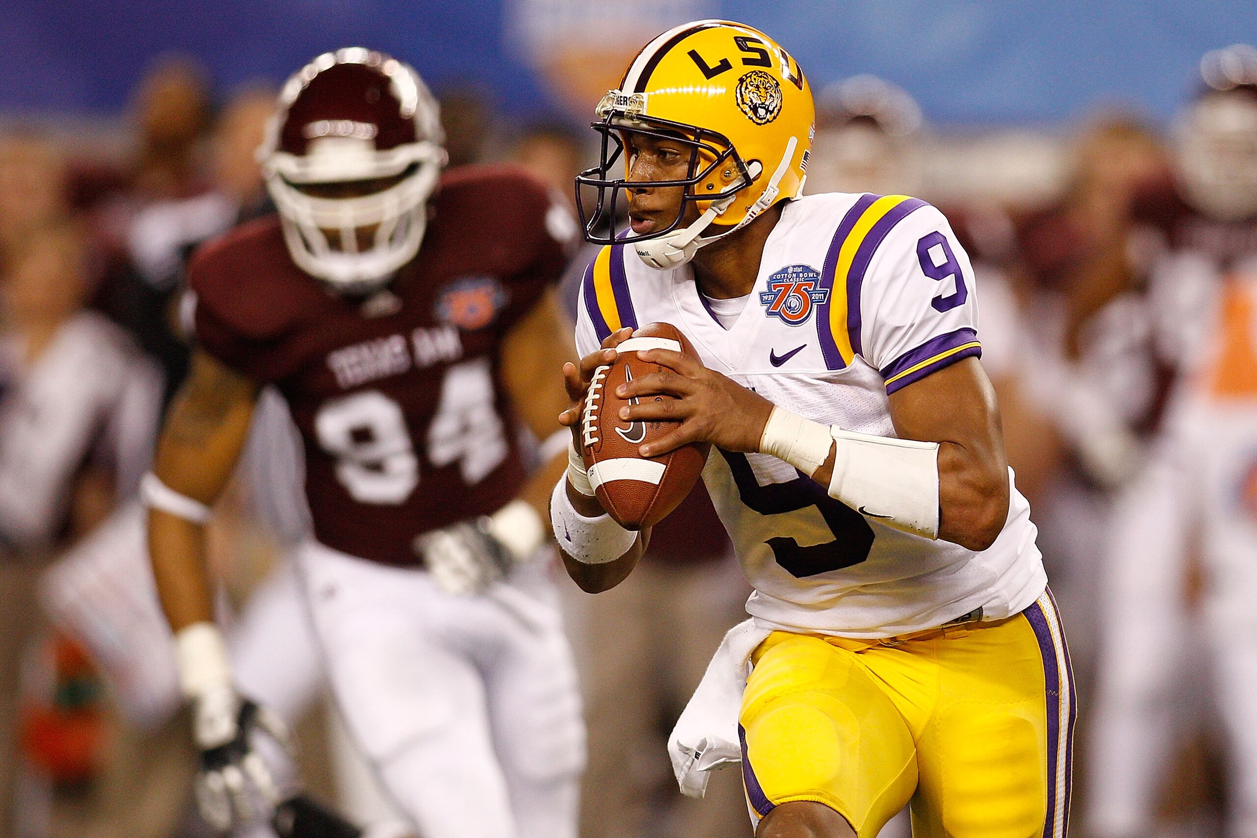 ARLINGTON, TX - JANUARY 07:  Jordan Jefferson #9 of the Louisiana State University Tigers looks to throw a pass during the game against the Texas A&M Aggies during the AT&T Cotton Bowl at Cowboys Stadium on January 7, 2011 in Arlington, Texas.  (Photo by