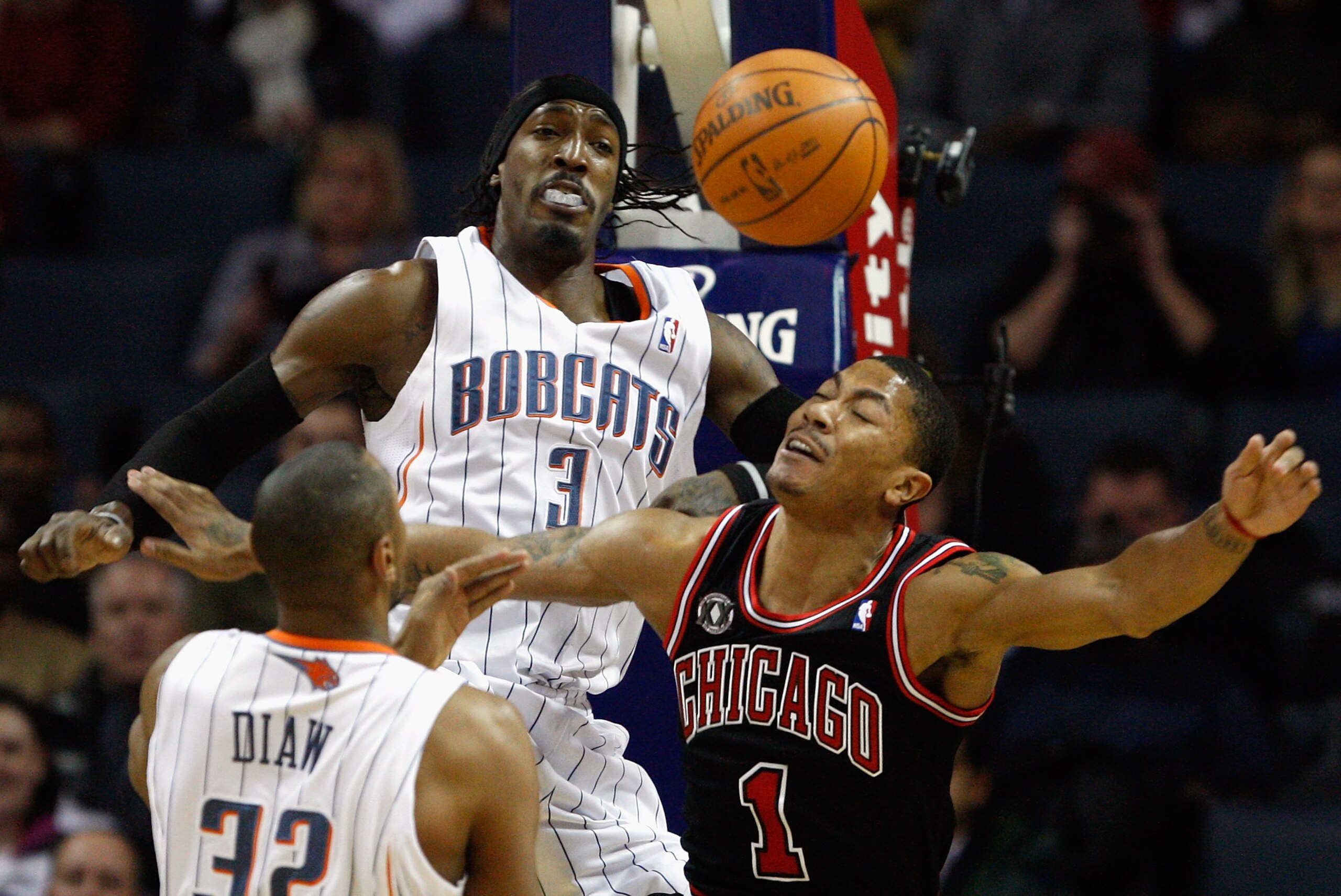 CHARLOTTE, NC - JANUARY 12:  Derrick Rose #1 of the Chicago Bulls has his shot blocked by Gerald Wallace #3 of the Charlotte Bobcats during their game at Time Warner Cable Arena on January 12, 2011 in Charlotte, North Carolina. NOTE TO USER: User expressl