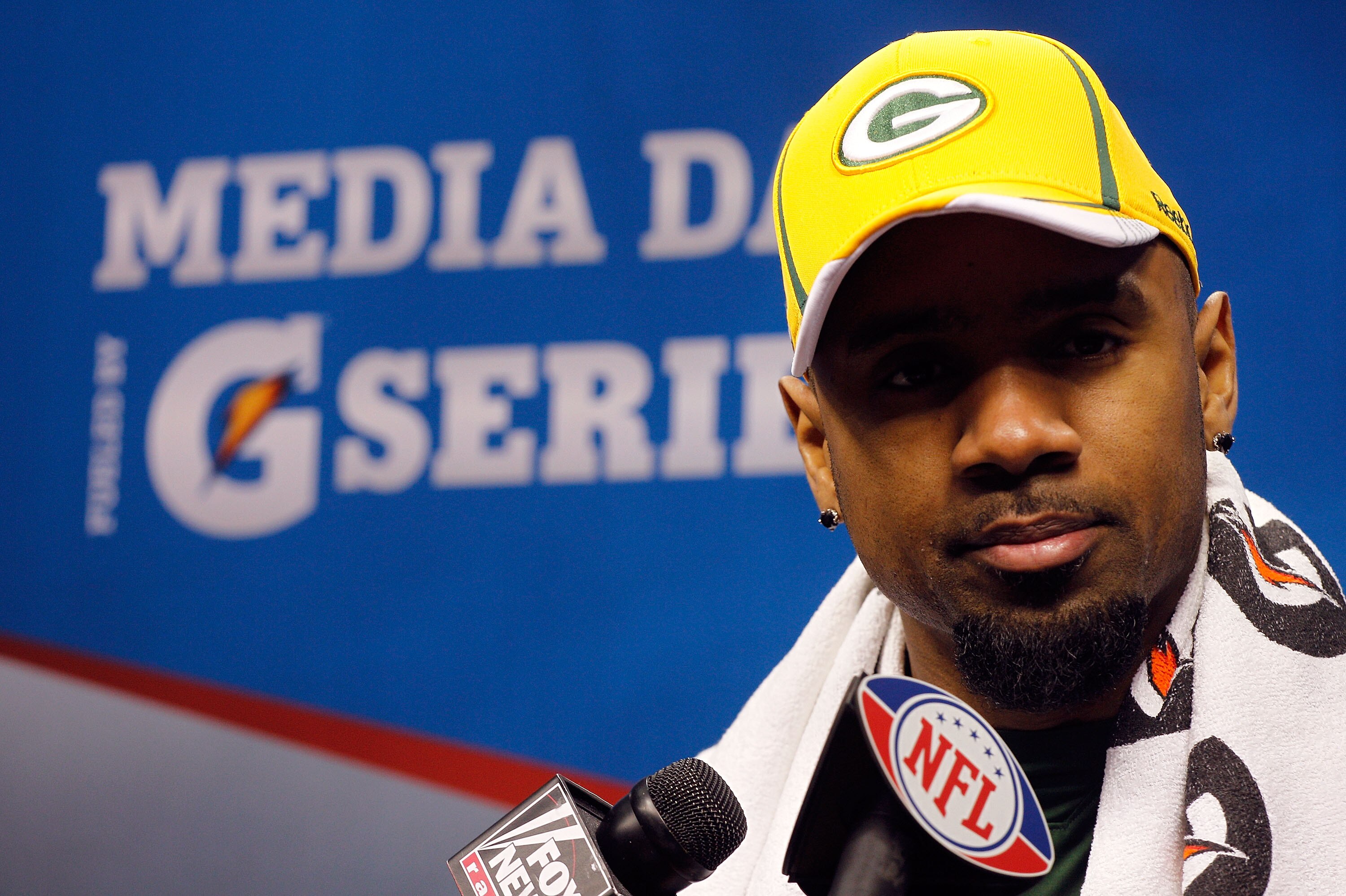 ARLINGTON, TX - FEBRUARY 01:  Charles Woodson #21 of the Green Bay Packers addresses the media during Super Bowl XLV Media Day ahead of Super Bowl XLV at Cowboys Stadium on February 1, 2011 in Arlington, Texas. The Pittsburgh Steelers will play the Green