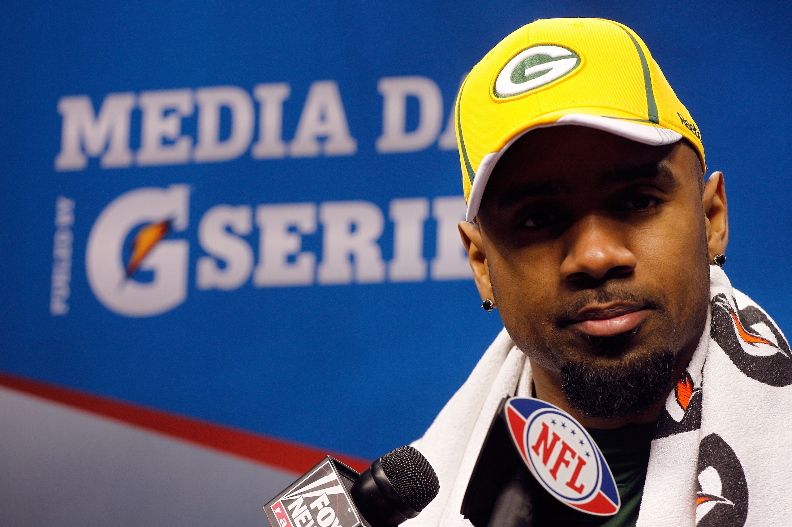 ARLINGTON, TX - FEBRUARY 01:  Charles Woodson #21 of the Green Bay Packers addresses the media during Super Bowl XLV Media Day ahead of Super Bowl XLV at Cowboys Stadium on February 1, 2011 in Arlington, Texas. The Pittsburgh Steelers will play the Green