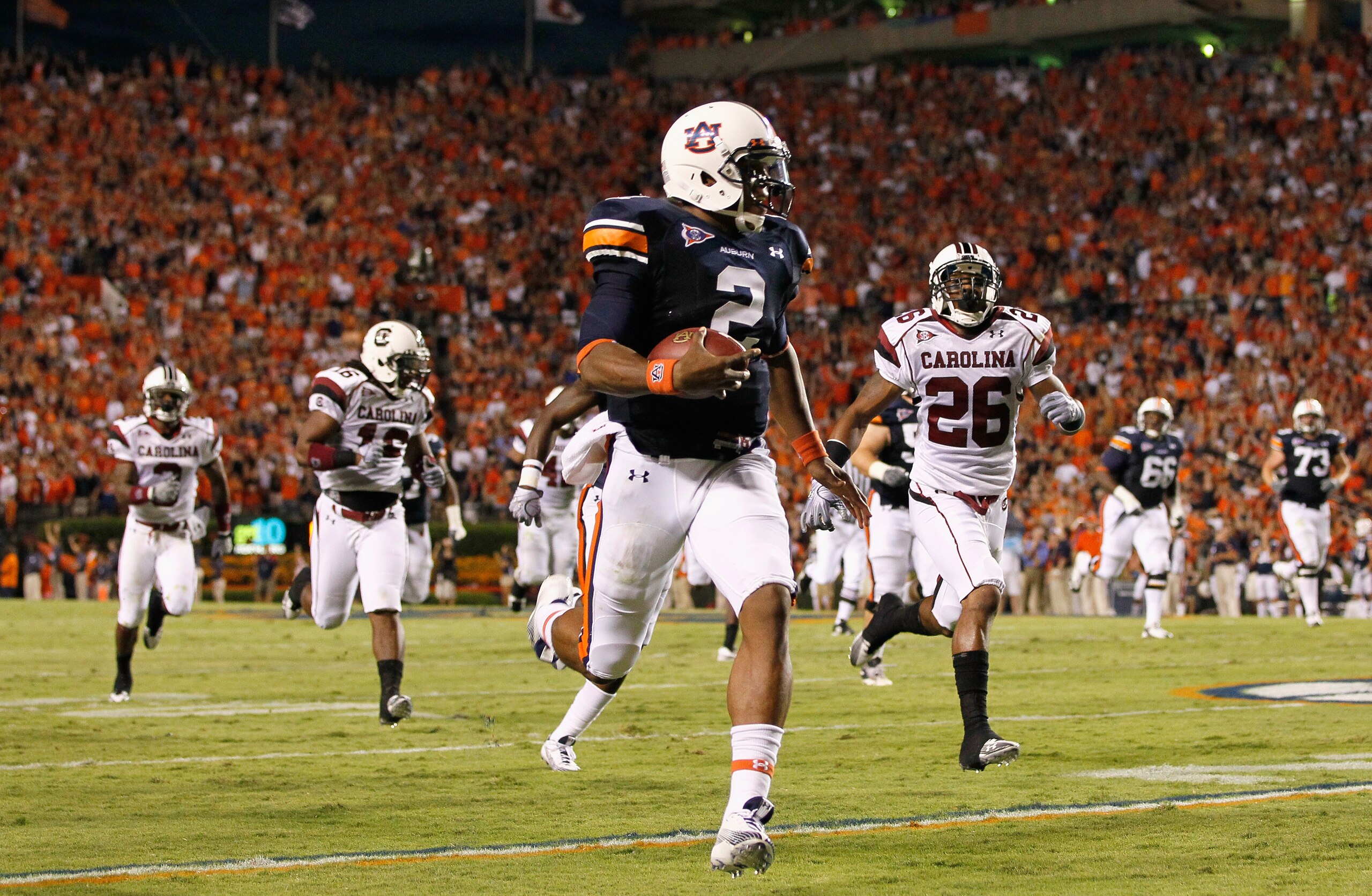 AUBURN, AL - SEPTEMBER 25:  Quarterback Cameron Newton #2 of the Auburn Tigers rushes for a touchdown against the South Carolina Gamecocks at Jordan-Hare Stadium on September 25, 2010 in Auburn, Alabama.  (Photo by Kevin C. Cox/Getty Images)