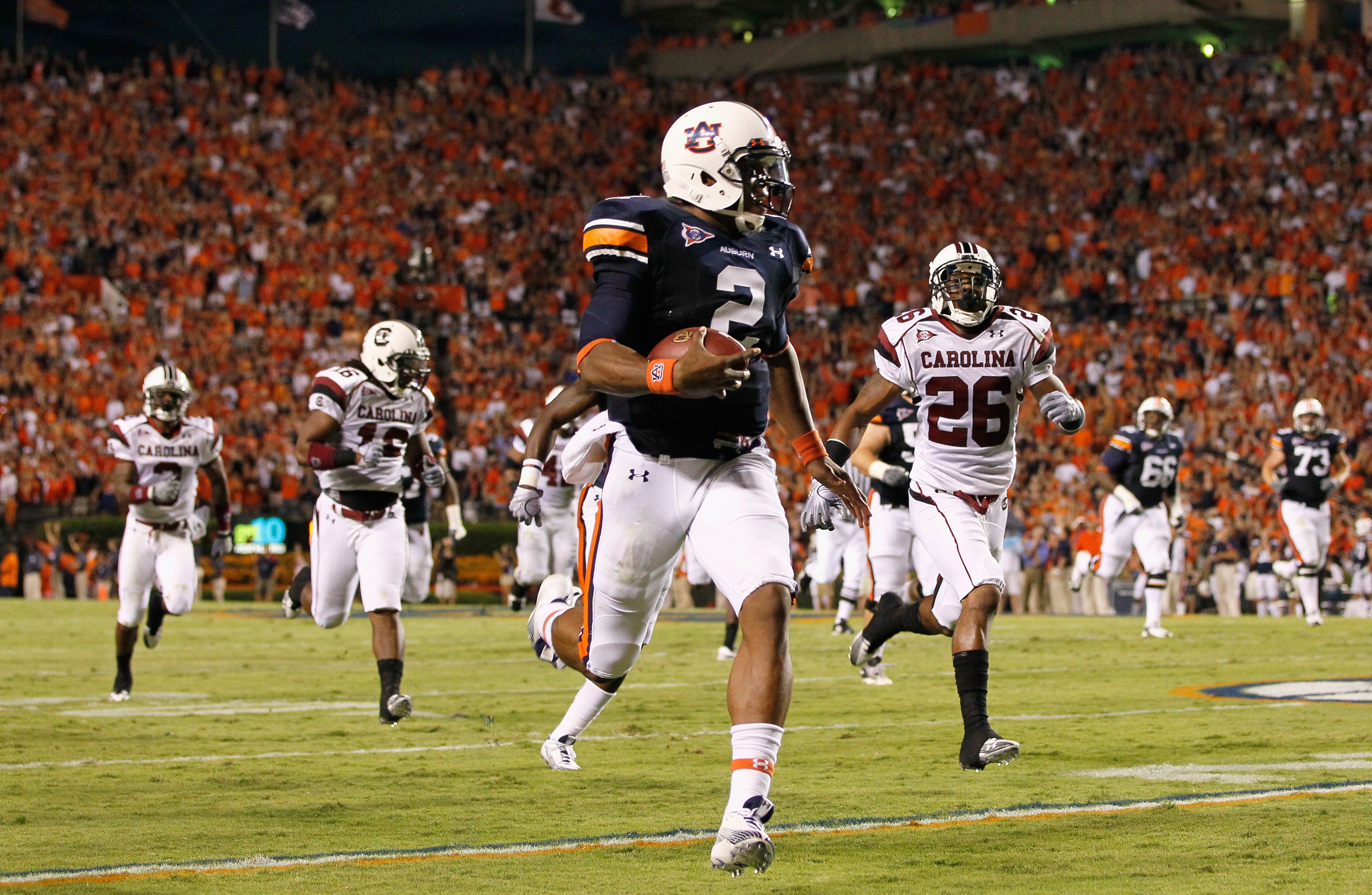 AUBURN, AL - SEPTEMBER 25:  Quarterback Cameron Newton #2 of the Auburn Tigers rushes for a touchdown against the South Carolina Gamecocks at Jordan-Hare Stadium on September 25, 2010 in Auburn, Alabama.  (Photo by Kevin C. Cox/Getty Images)