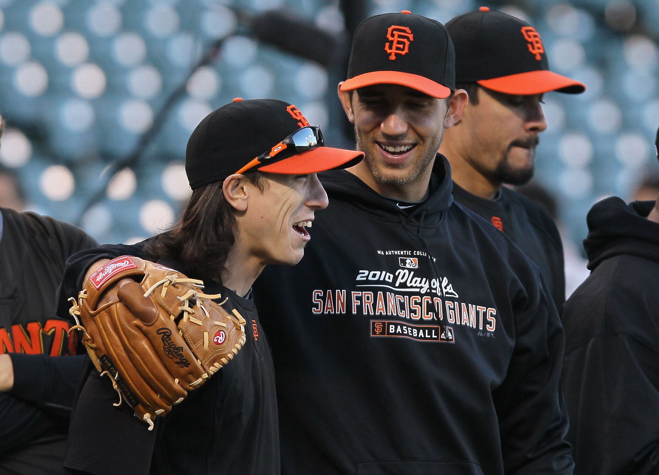 SAN FRANCISCO - OCTOBER 25:  Tim Lincecum #55 of the San Francisco Giants laughs with teammate Madison Bumgarner #40 during a team workout at AT&T Park on October 25, 2010 in San Francisco, California. The Giants are preparing to face the Texas Rangers in