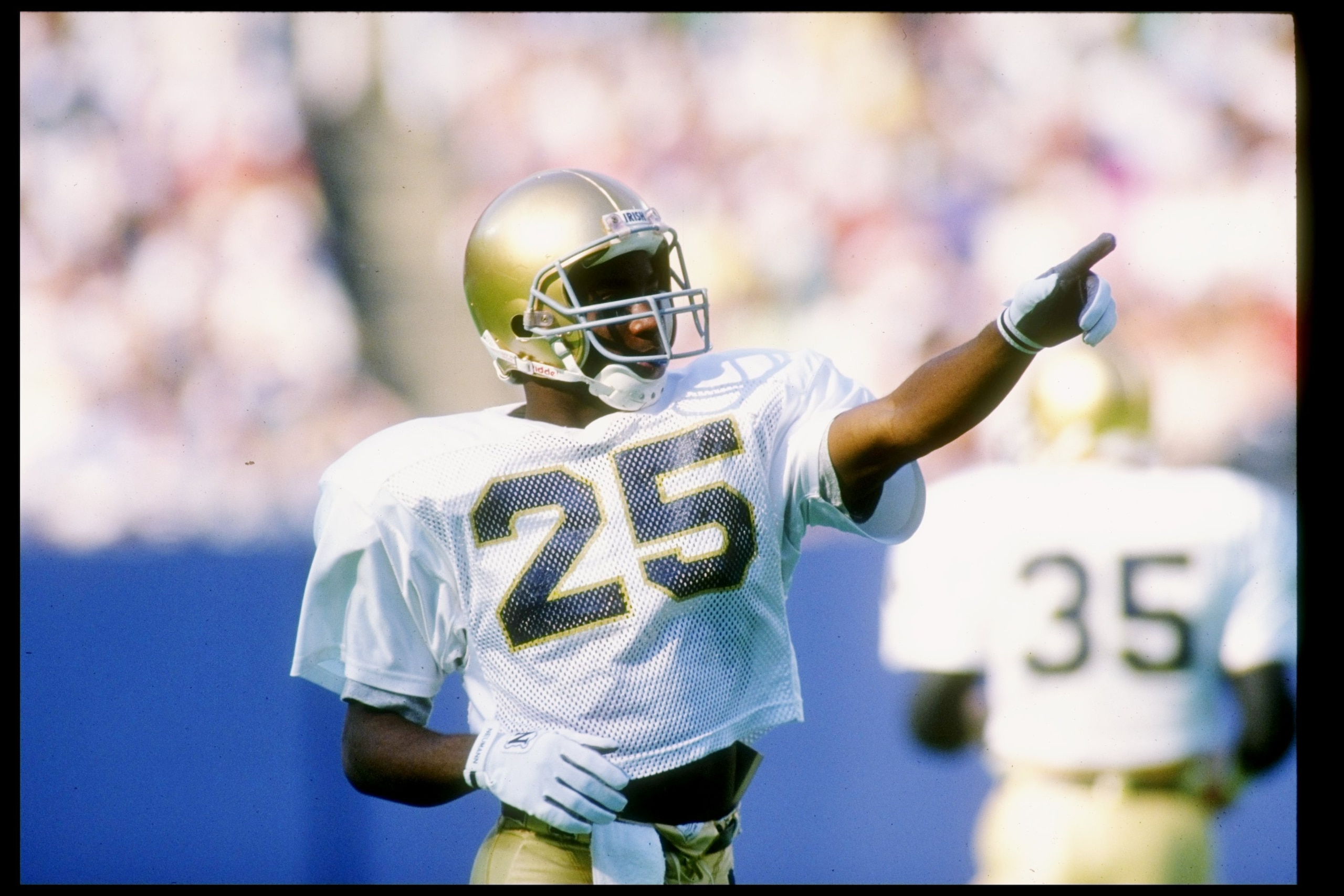 3 Nov 1990:  Flanker Raghib Ismail of the Notre Dame Fighting Irish points to the crowd during a game against the Navy Midshipman at Giants Stadium in East Rutherford, New Jersey.  Notre Dame won the game 52-31. Mandatory Credit: Rick Stewart  /Allsport