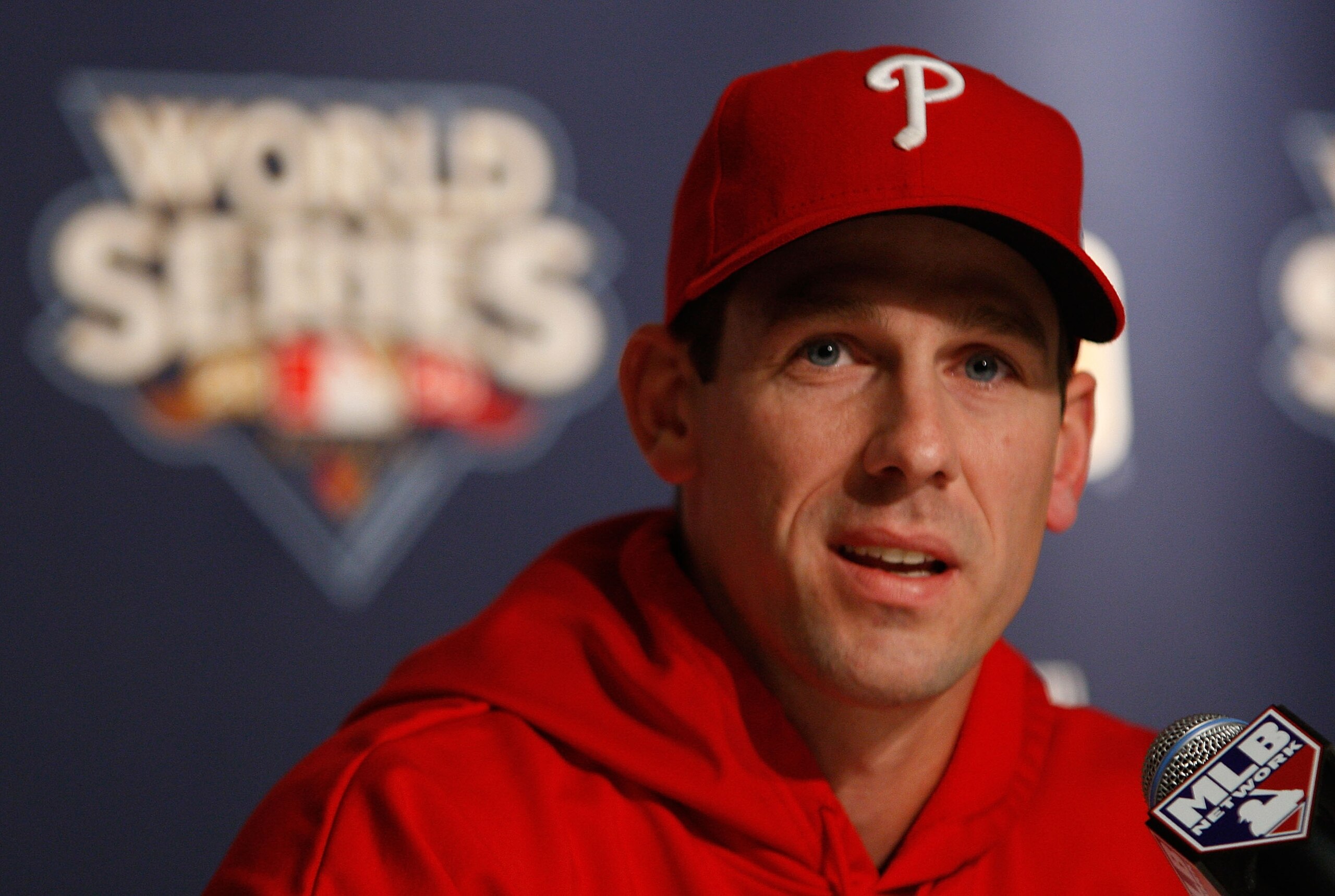 NEW YORK - OCTOBER 27:  Cliff Lee #34 of the Philadelphia Phillies speaks to the media after World Series workouts on October 27, 2009 at Yankee Stadium in the Bronx borough of New York City.  (Photo by Jared Wickerham/Getty Images)