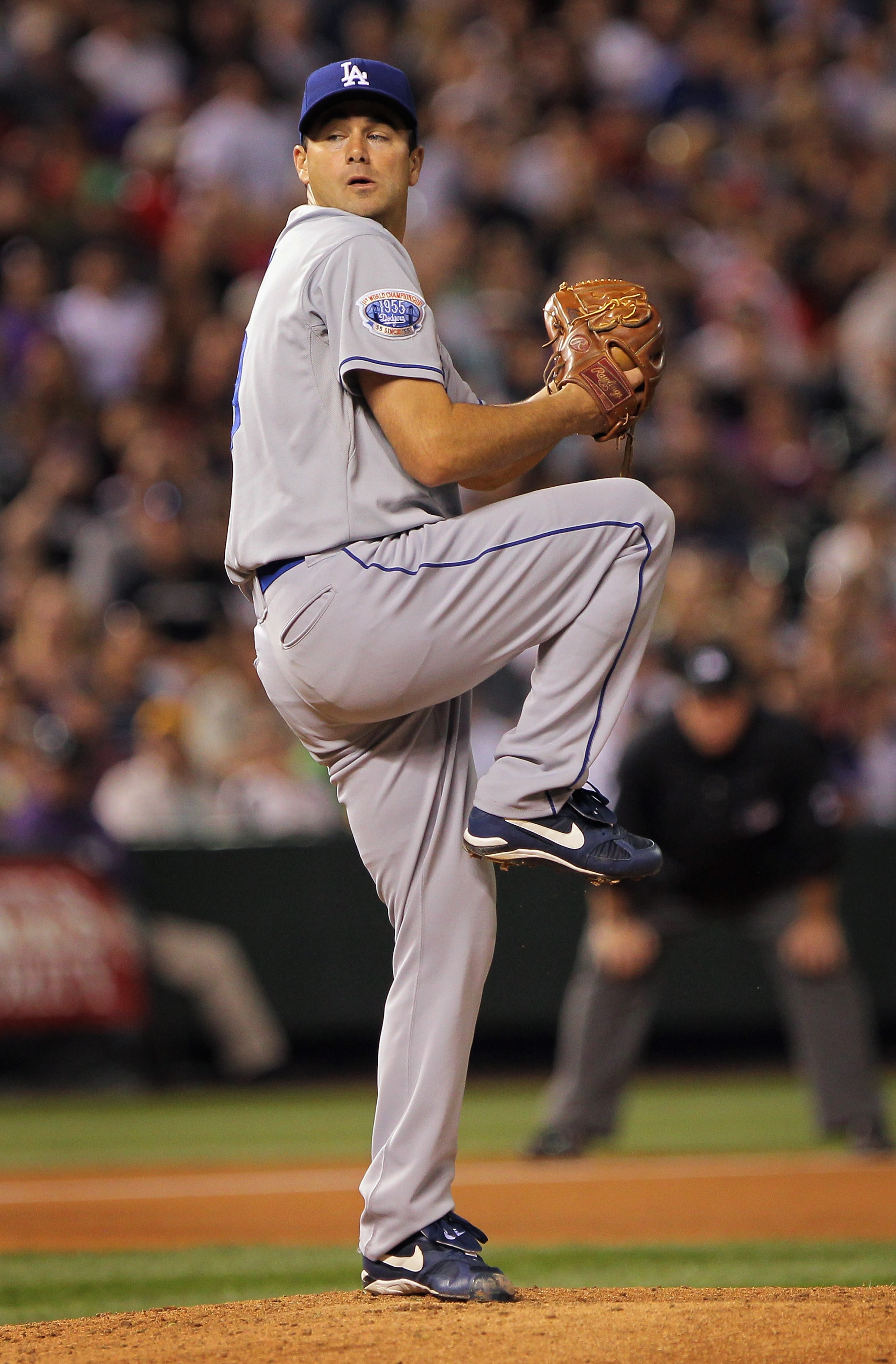 DENVER - SEPTEMBER 27:  Starting pitcher Ted Lilly #29 of the Los Angeles Dodgers delivers against the Colorado Rockies at Coors Field on September 25, 2010 in Denver, Colorado. Lilly earned the win as the Dodgers defeated the Rockies 3-1.  (Photo by Doug