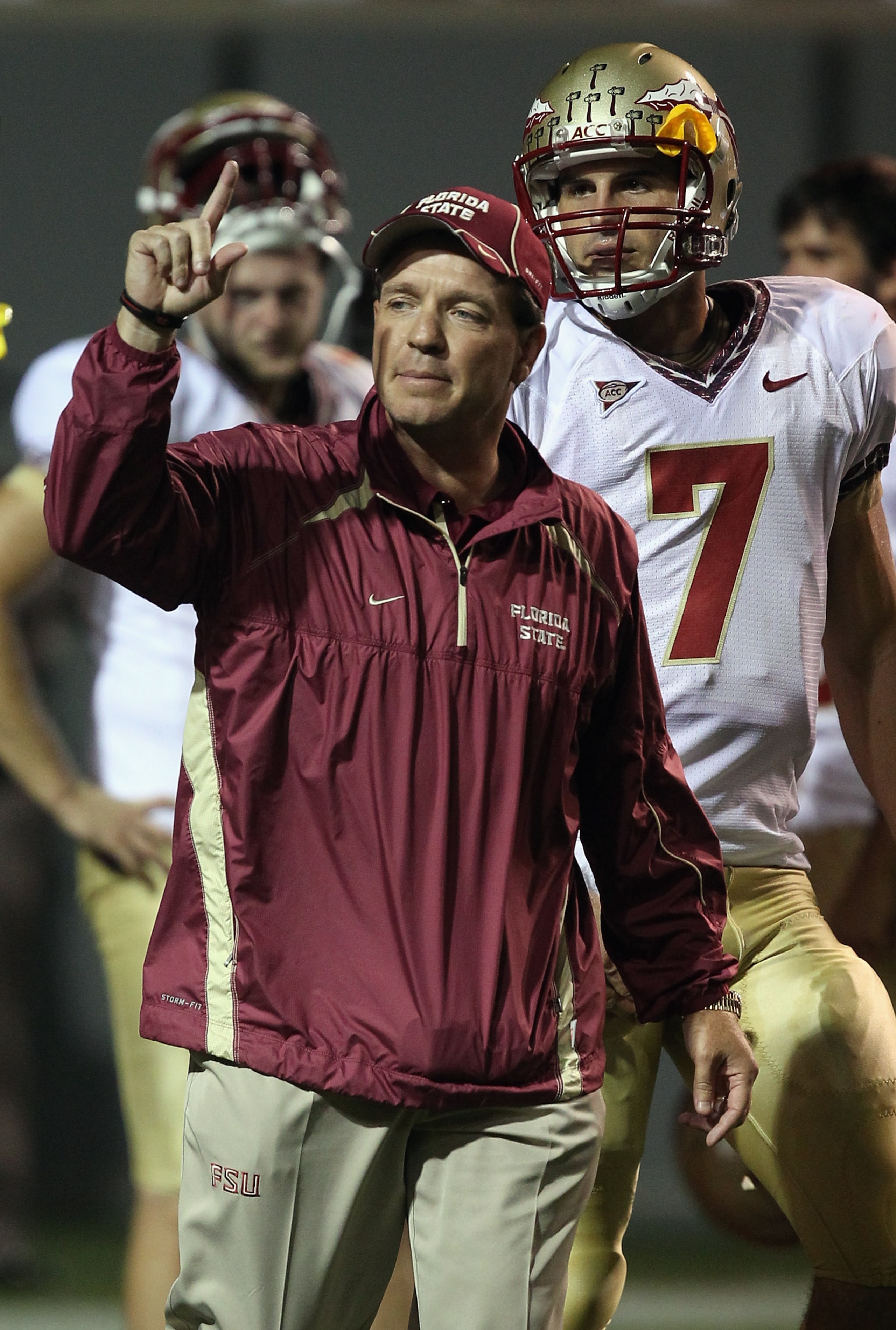 RALEIGH, NC - OCTOBER 28:  Head coach Jimbo Fisher and quarterback Christian Ponder #7 of the Florida State Seminoles prepare for their game against the North Carolina State Wolfpack at Carter-Finley Stadium on October 28, 2010 in Raleigh, North Carolina.
