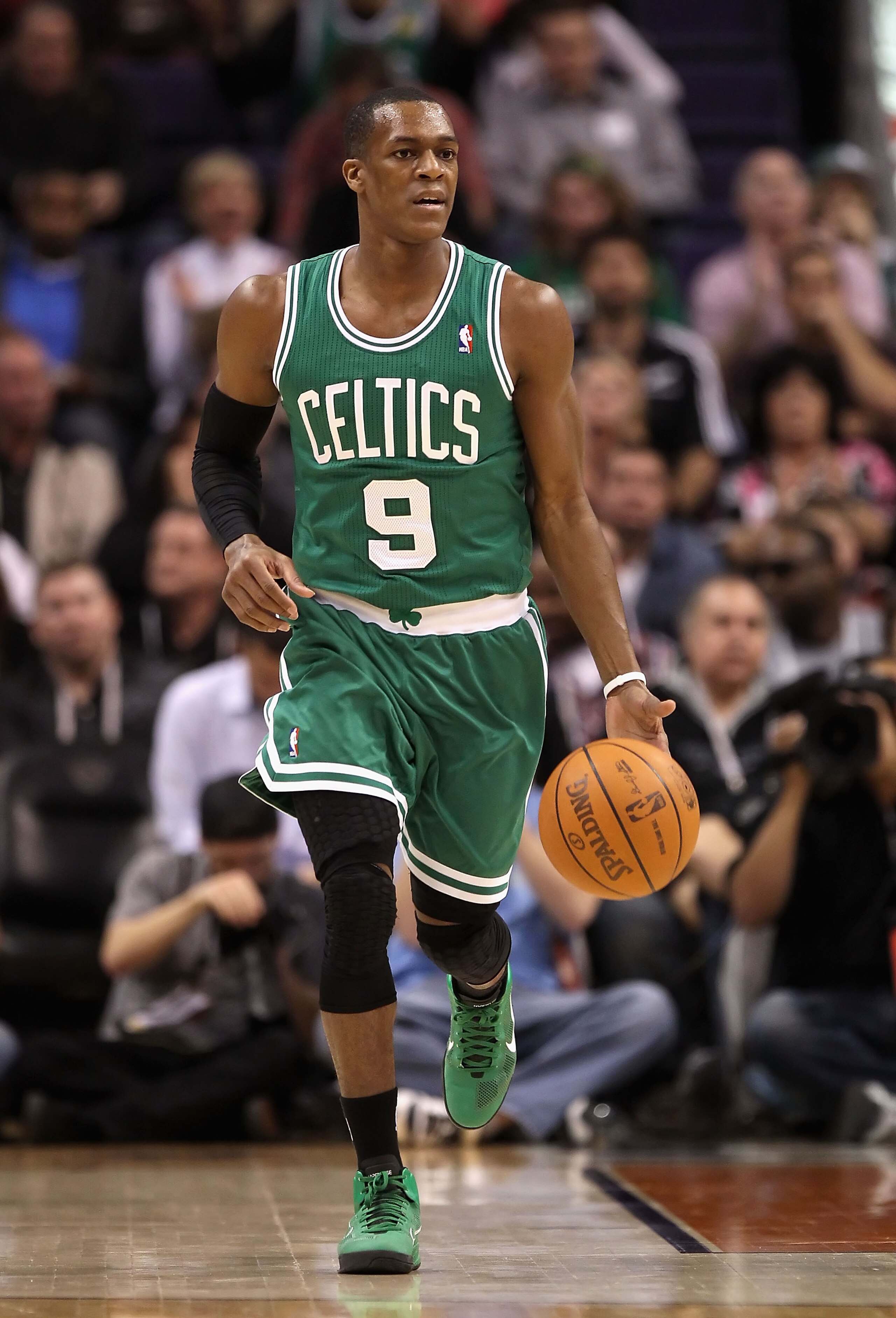 PHOENIX, AZ - JANUARY 28: Rajon Rondo #9 of the Boston Celtics handles the ball during the NBA game against the Phoenix Suns at US Airways Center on January 28, 2011 in Phoenix, Arizona. The Suns defeated the Celtics 88-71. NOTE TO USER: User expressly PHOENIX, AZ - JANUARY 28: Rajon Rondo #9 of the Boston Celtics handles the ball during the NBA game against the Phoenix Suns at US Airways Center on January 28, 2011 in Phoenix, Arizona. The Suns defeated the Celtics 88-71. NOTE TO USER: User expressly