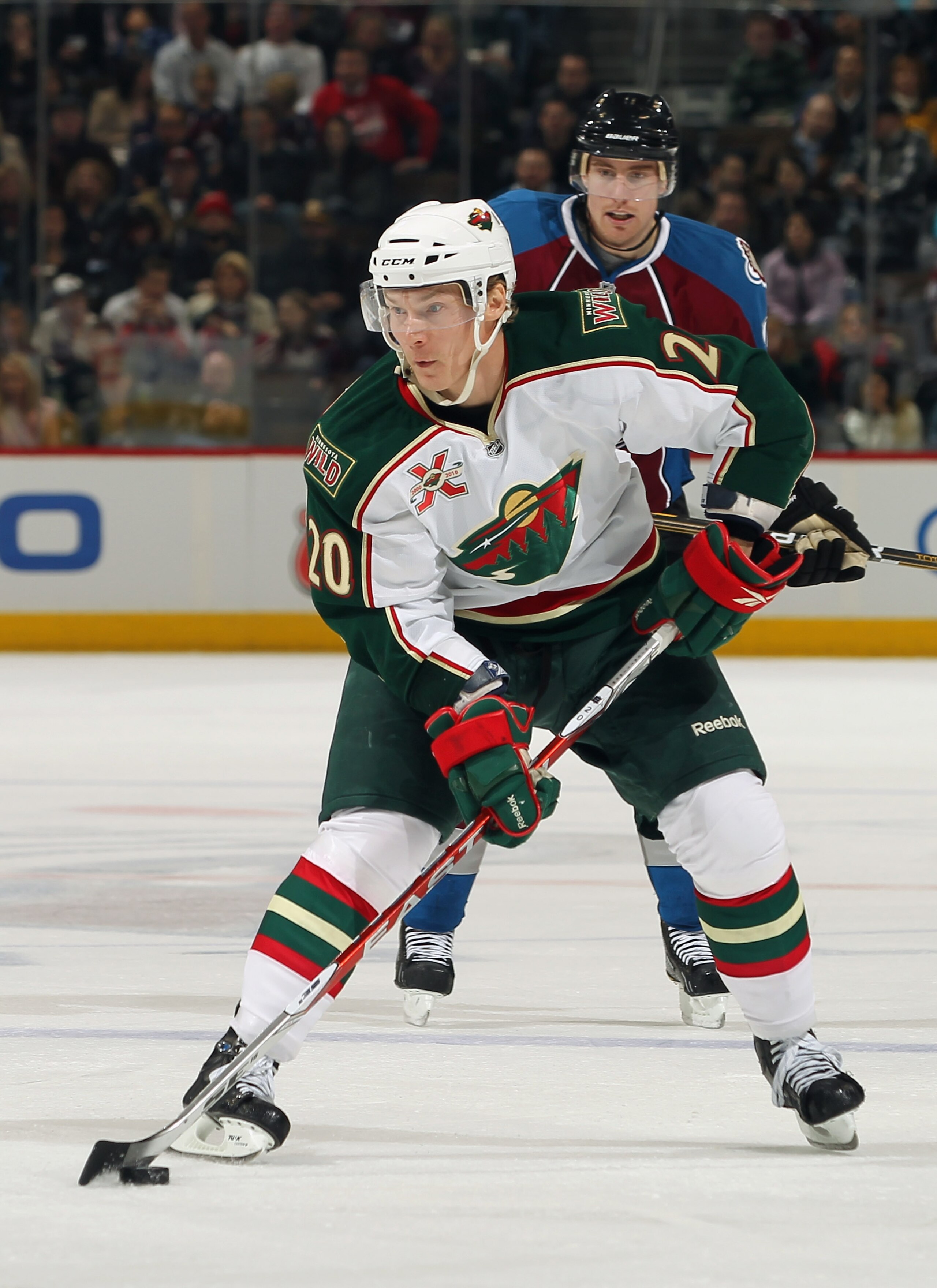DENVER - DECEMBER 23:  Antti Miettinen #20 of the Minnesota Wild controls the puck against the Colorado Avalanche at the Pepsi Center on December 23, 2010 in Denver, Colorado. The Wild defeated the Avalanche 3-1.  (Photo by Doug Pensinger/Getty Images)