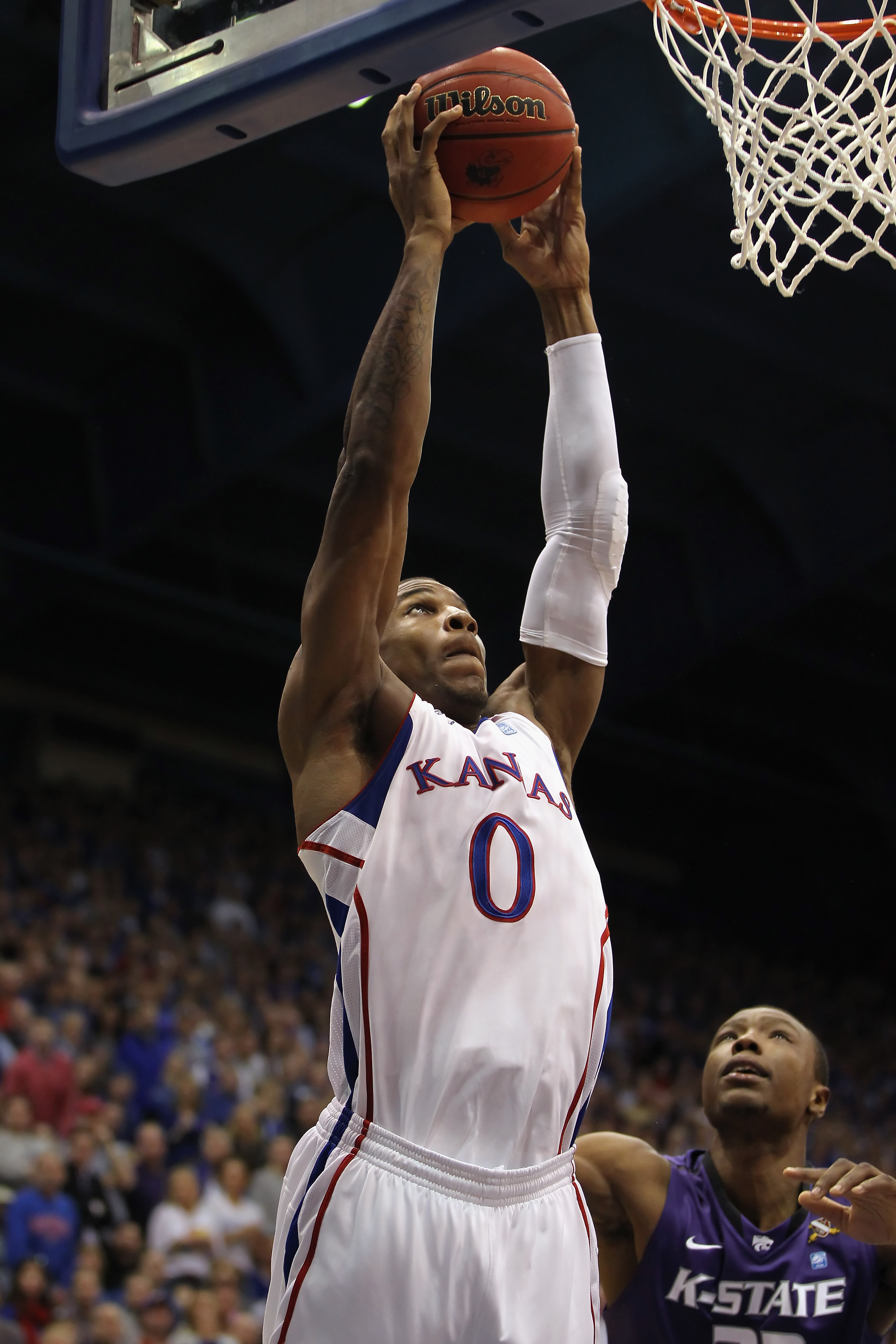 LAWRENCE, KS - JANUARY 29:  Thomas Robinson #0 of the Kansas Jayhawks dunks during the game against the Kansas State Wildcats on January 29, 2011 at Allen Fieldhouse in Lawrence, Kansas.  (Photo by Jamie Squire/Getty Images)