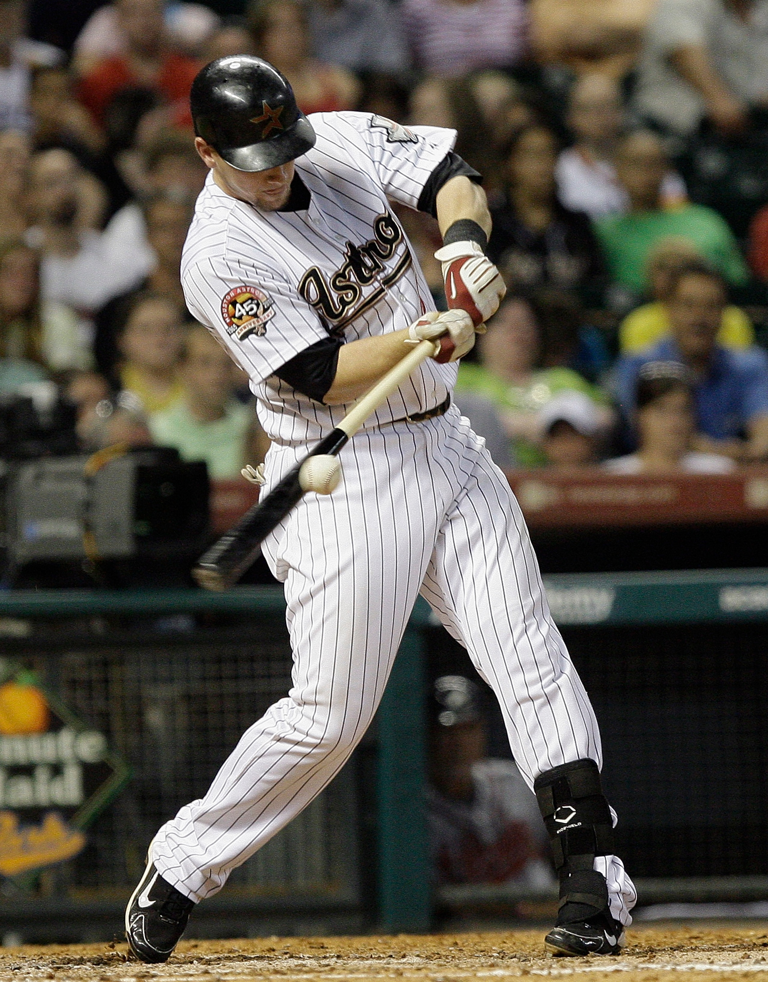 HOUSTON - AUGUST 10:  Chris Johnson #23 of the Houston Astros shatters his bat as he singles to right field against the Atlanta Braves at Minute Maid Park on August 10, 2010 in Houston, Texas.  (Photo by Bob Levey/Getty Images)