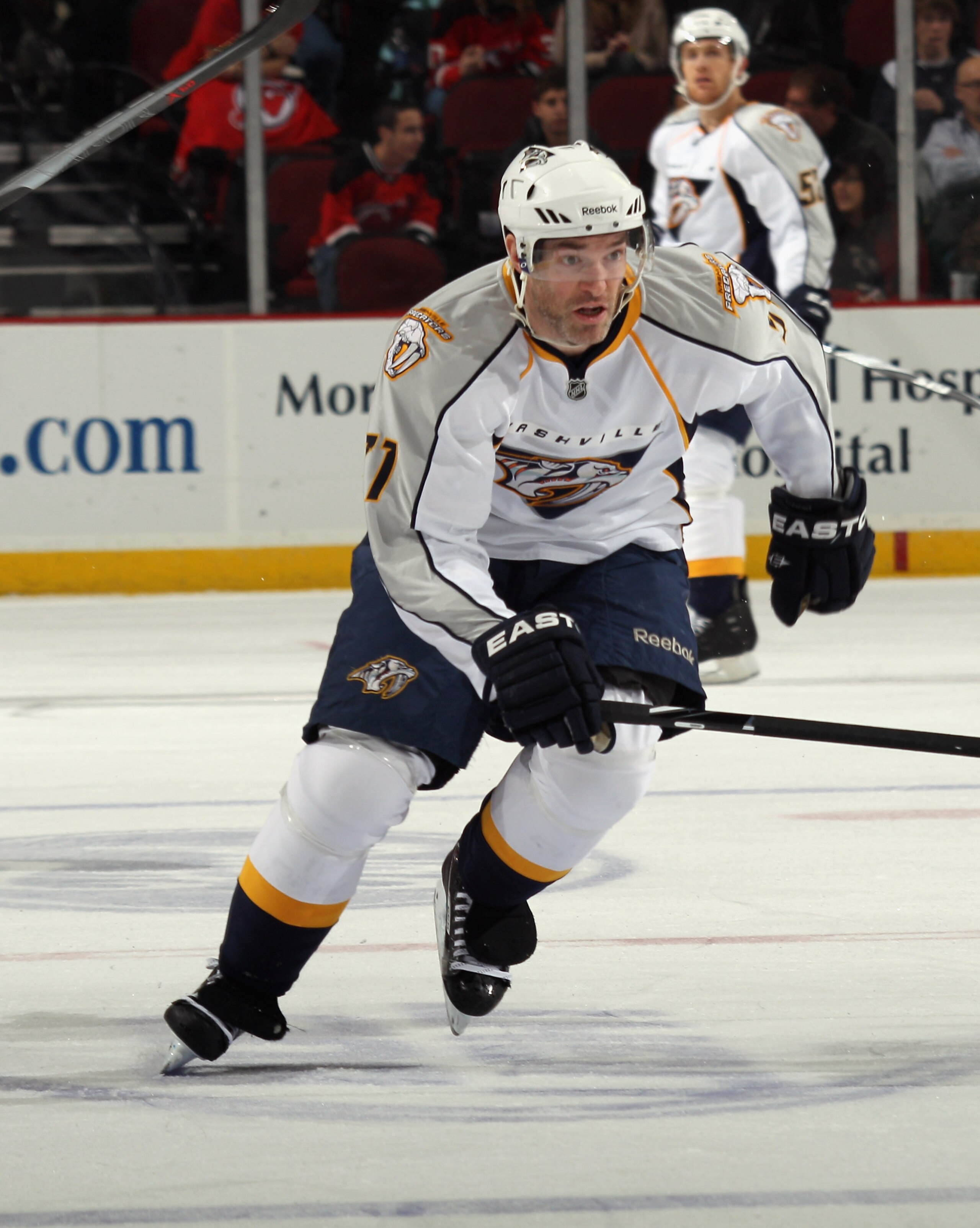 NEWARK, NJ - DECEMBER 17:  J.P. Dumont #71 of the Nashville Predators skates against the New Jersey Devils at the Prudential Center on December 17, 2010 in Newark, New Jersey.  (Photo by Bruce Bennett/Getty Images)