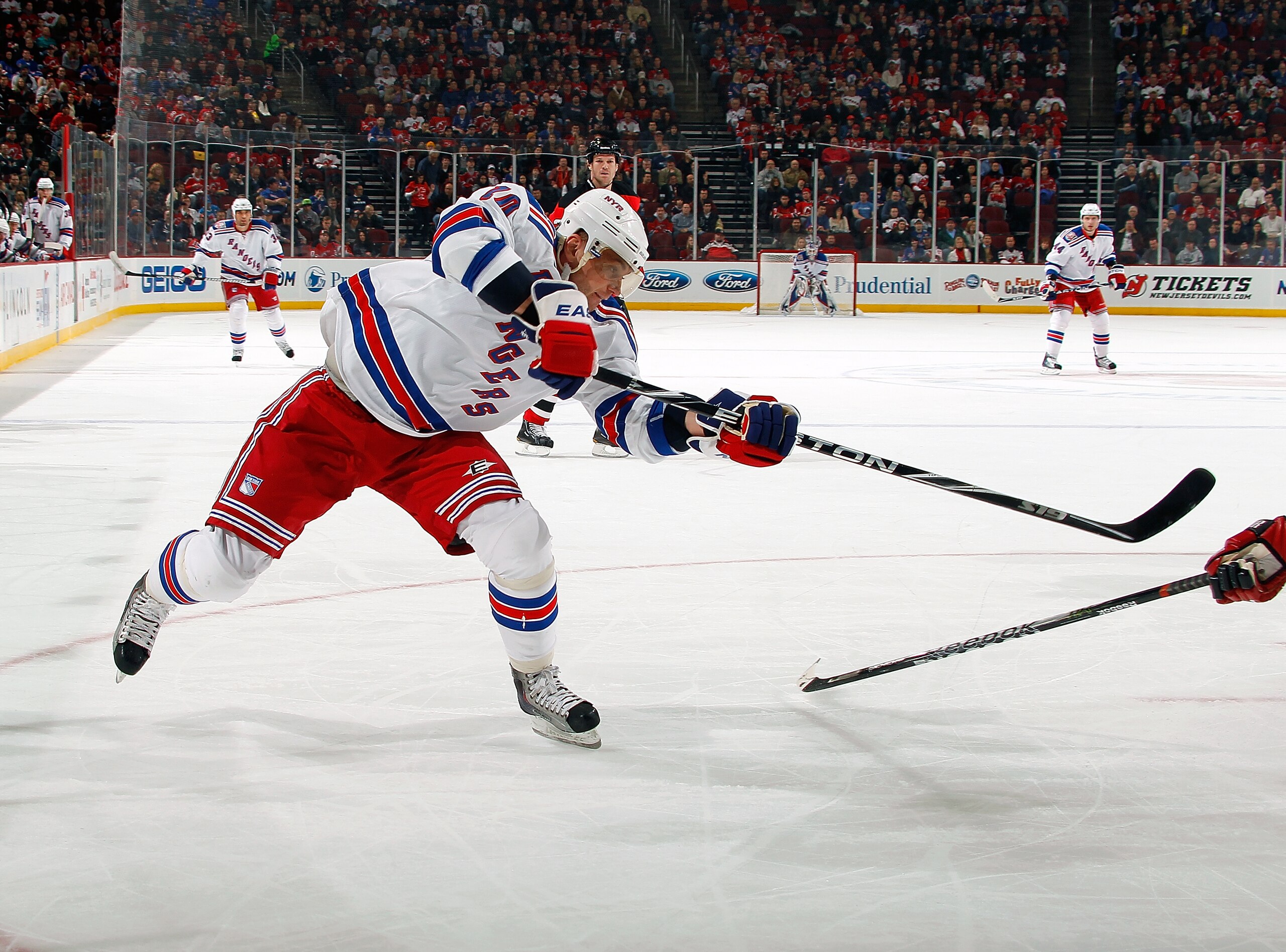 NEWARK, NJ - DECEMBER 29: Marion Gaborik #10 of the New York Rangers takes a shot during a game against the New Jersey Devils on December 29, 2010 at the Prudential Center in Newark, New Jersey. The Rangers won 3-1.  (Photo by Lou Capozzola/Getty Images)