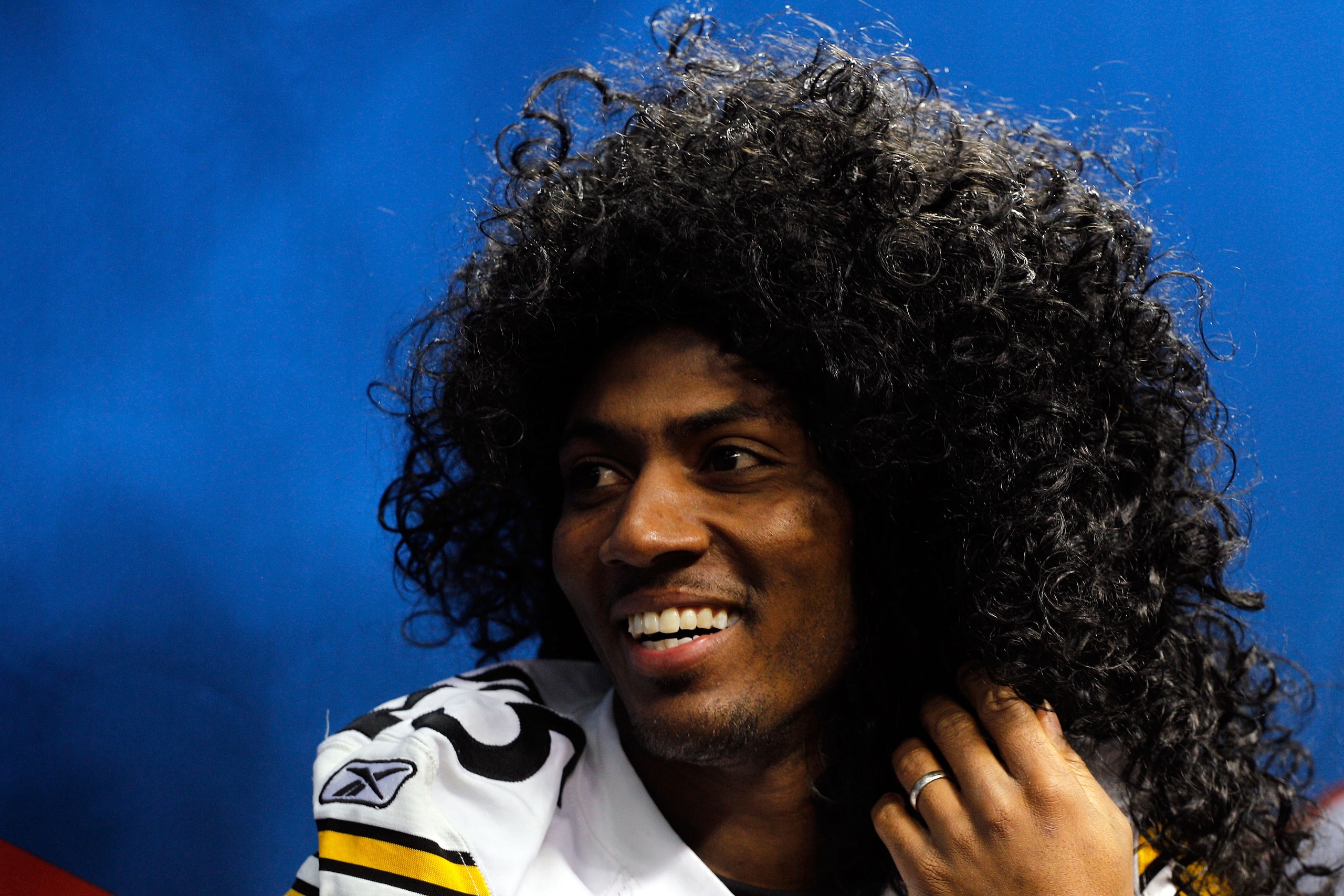 ARLINGTON, TX - FEBRUARY 01:  Ryan Clark #25 of the Pittsburgh Steelers wears a Troy Polamalu #43 wig during Super Bowl XLV Media Day ahead of Super Bowl XLV at Cowboys Stadium on February 1, 2011 in Arlington, Texas. The Pittsburgh Steelers will play the