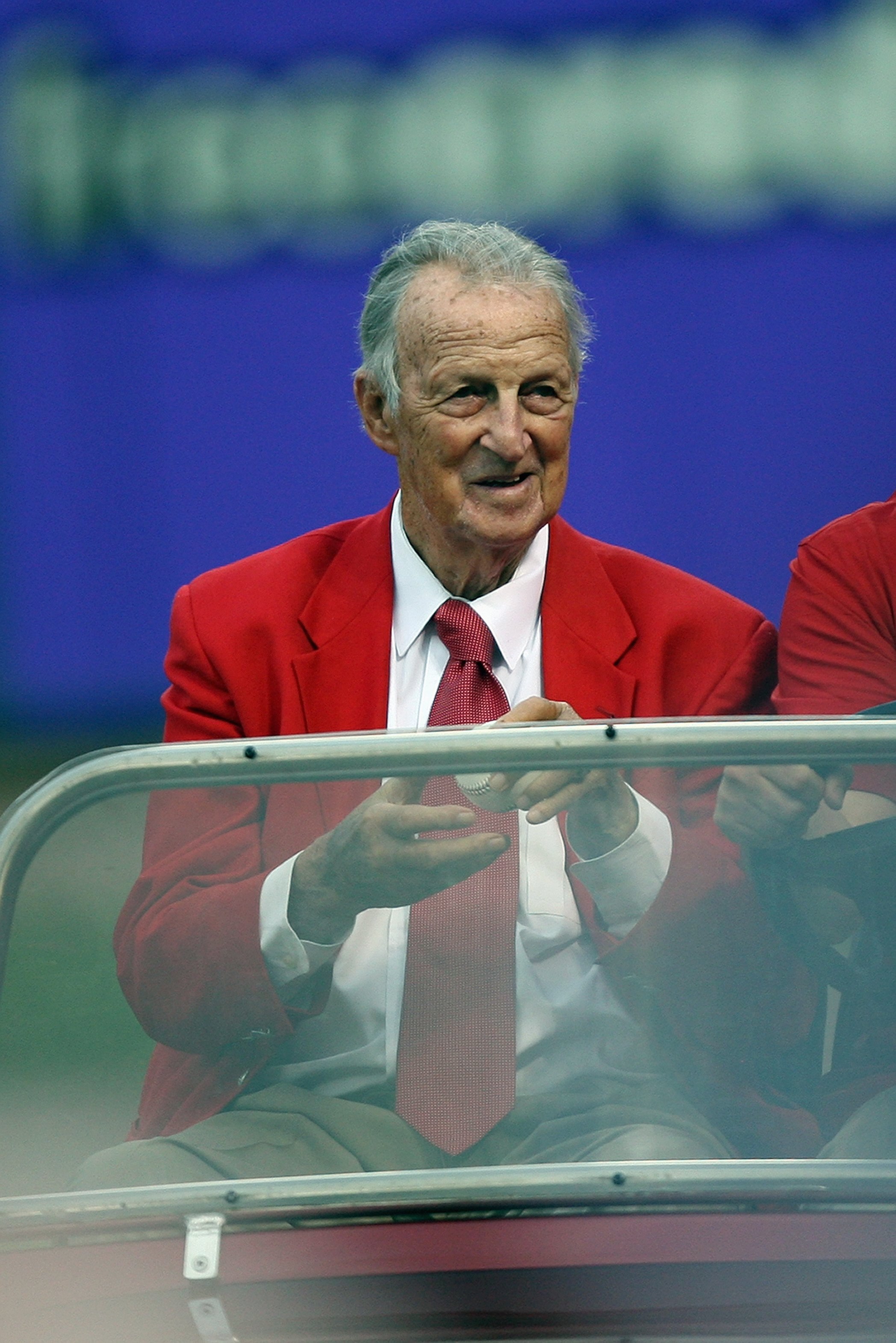 ST. LOUIS, MO - JULY 14:  Hall of Famer Stan Musial of the St. Louis Cardinals holds the ball for the ceremonial first pitch before the 2009 MLB All-Star Game at Busch Stadium on July 14, 2009 in St. Louis, Missouri. (Photo by Dilip Vishwanat/Getty Images