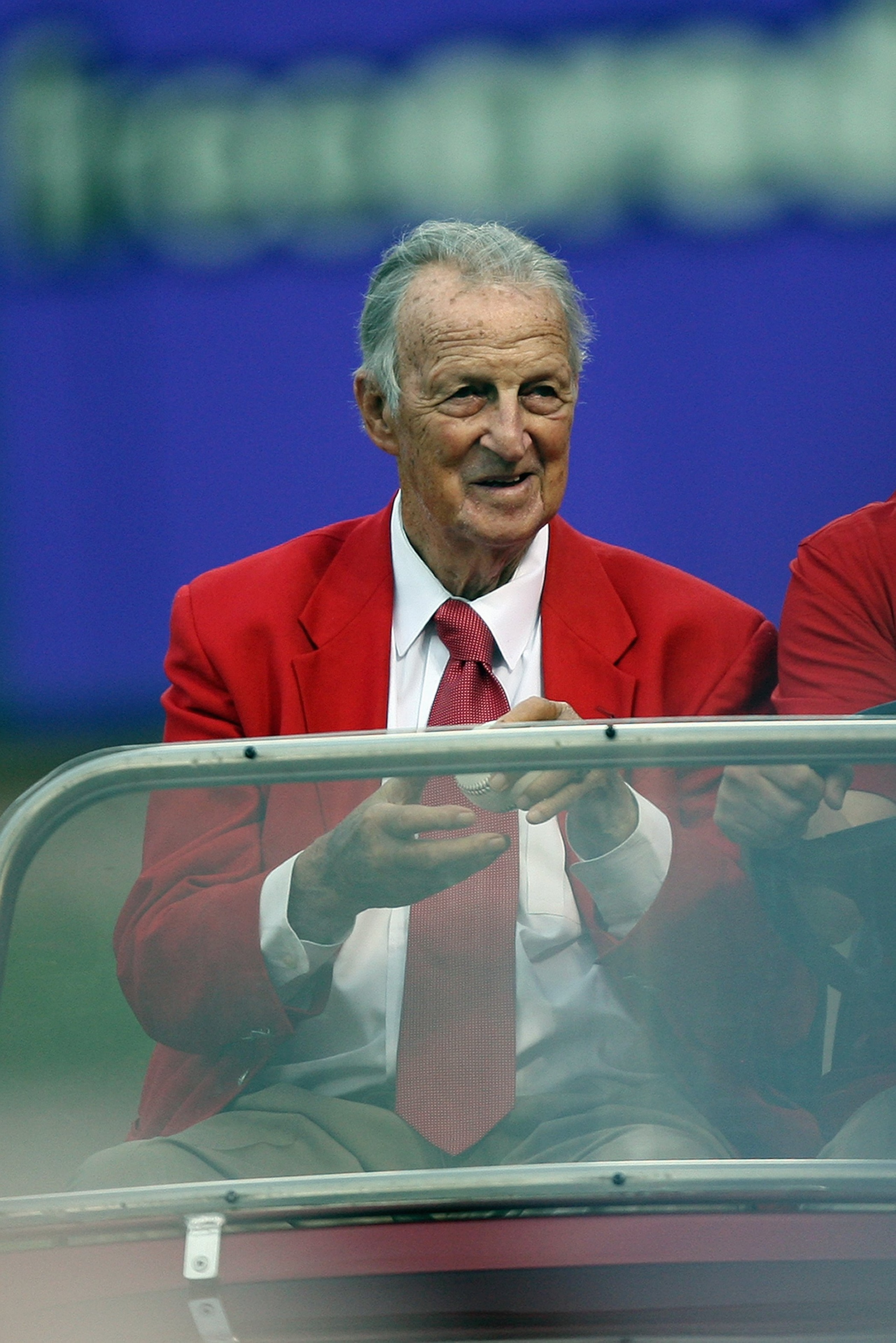 ST. LOUIS, MO - JULY 14:  Hall of Famer Stan Musial of the St. Louis Cardinals holds the ball for the ceremonial first pitch before the 2009 MLB All-Star Game at Busch Stadium on July 14, 2009 in St. Louis, Missouri. (Photo by Dilip Vishwanat/Getty Images