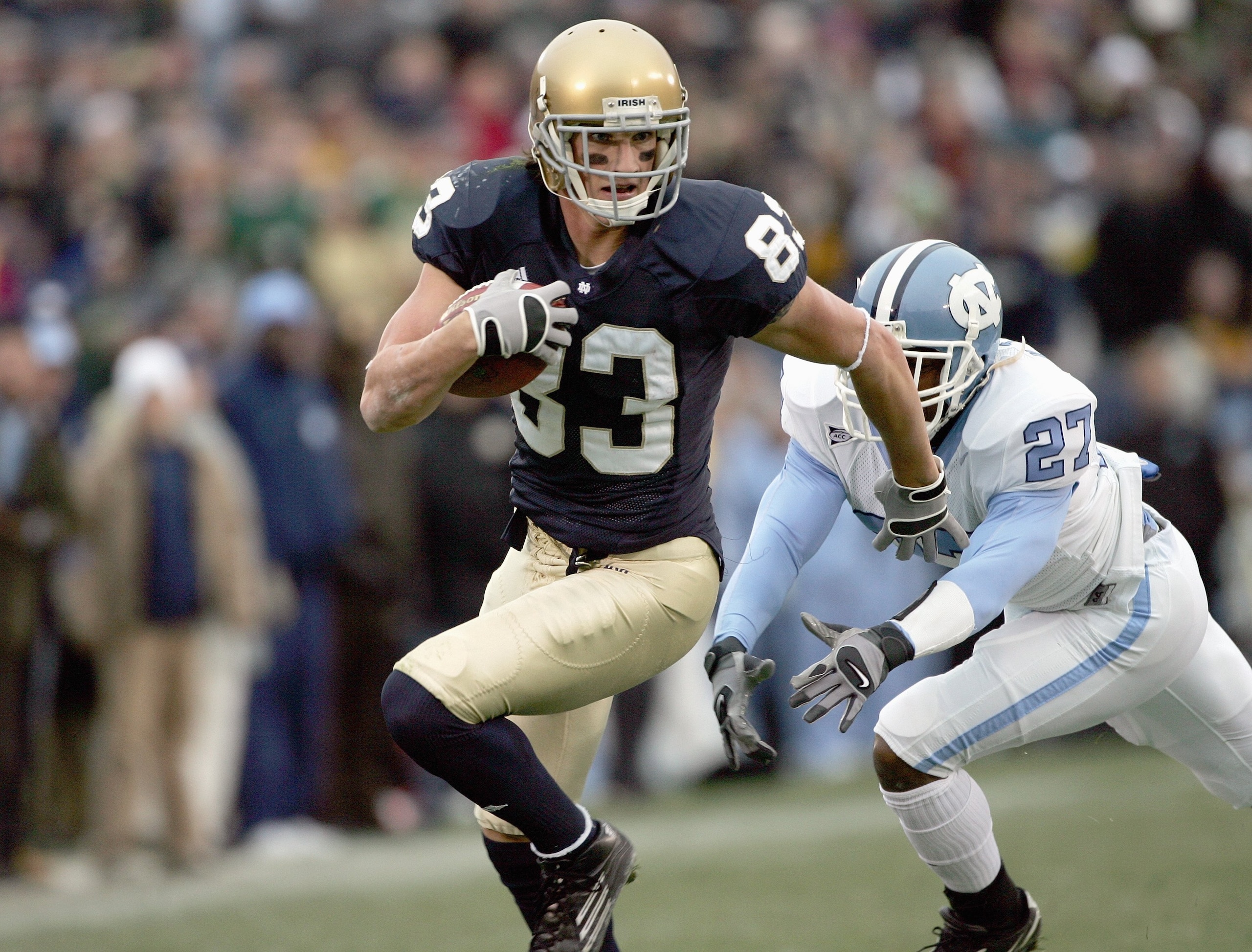 SOUTH BEND, IN - NOVEMBER 4:  Jeff Samardzija #83 of the Notre Dame Fighting Irish carries the ball during the game against the North Carolina Tar Heels on November 4, 2006 at Notre Dame Stadium in South Bend, Indiana. (Photo by Jonathan Daniel/Getty Imag