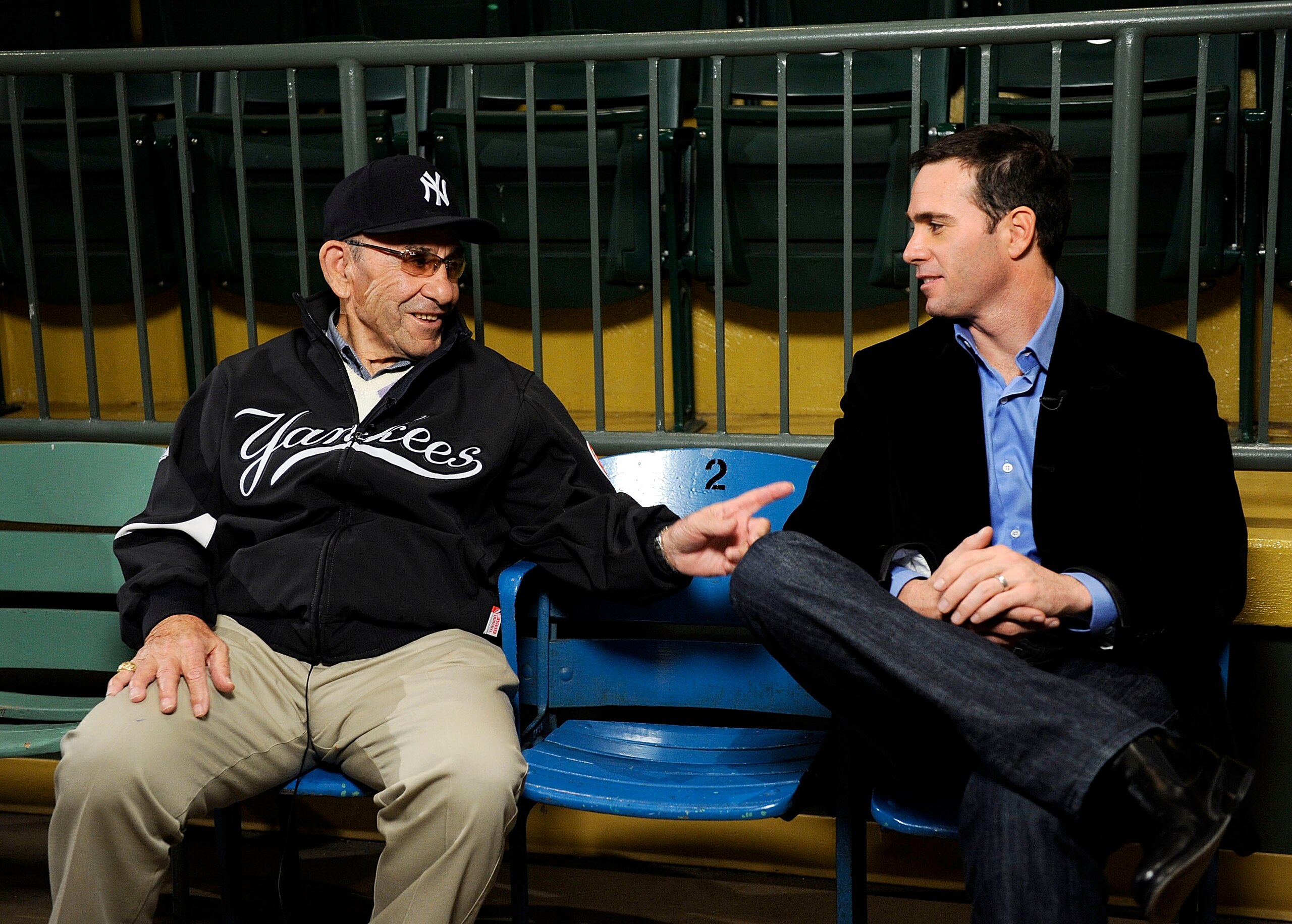 LITTLE FALLS, NJ - NOVEMBER 23:  Baseball Hall of Famer Yogi Berra and four-time Nascar champion Jimmie Johnson chat in the theater at the Yogi Berra Museum and and Learning Center on November 23, 2009 in Little Falls, New Jersey.  (Photo by Jeff Zelevans