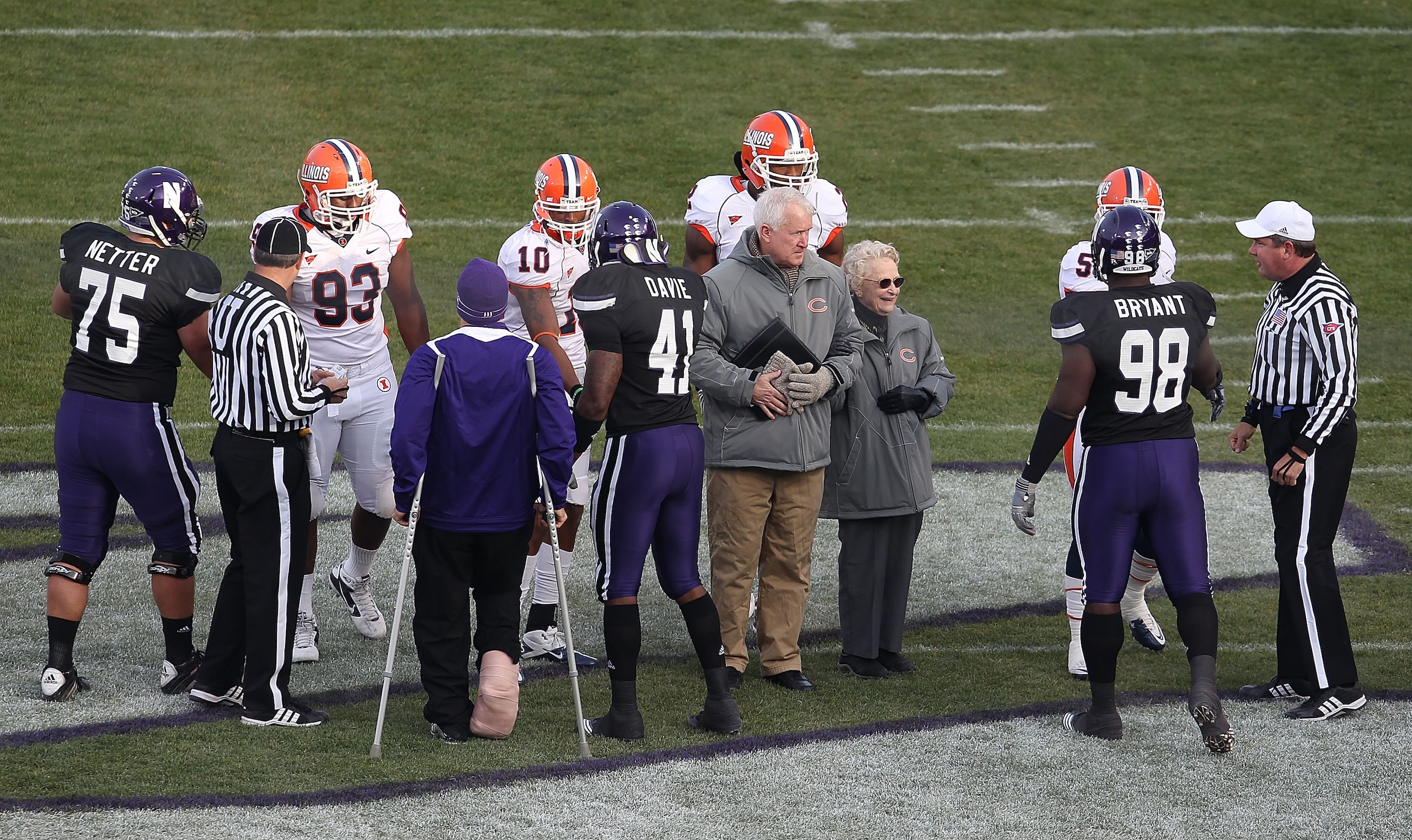 CHICAGO - NOVEMBER 20: Virginia McCaskey, daughter of NFL founder George Halas and an owner of the Chicago Bears, joined by son Pat, participates in the coin toss before a game between the Northwestern Wildcats and the Illinois Fighting Illini played at W