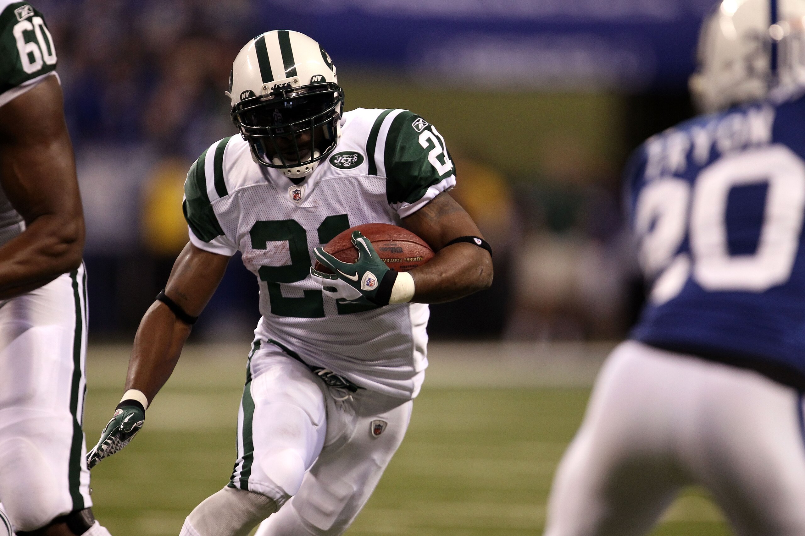 INDIANAPOLIS, IN - JANUARY 08:  LaDainian Tomlinson #21 of the New York Jets runs the ball against the Indianapolis Colts during their 2011 AFC wild card playoff game at Lucas Oil Stadium on January 8, 2011 in Indianapolis, Indiana. The Jets won 17-16. (P