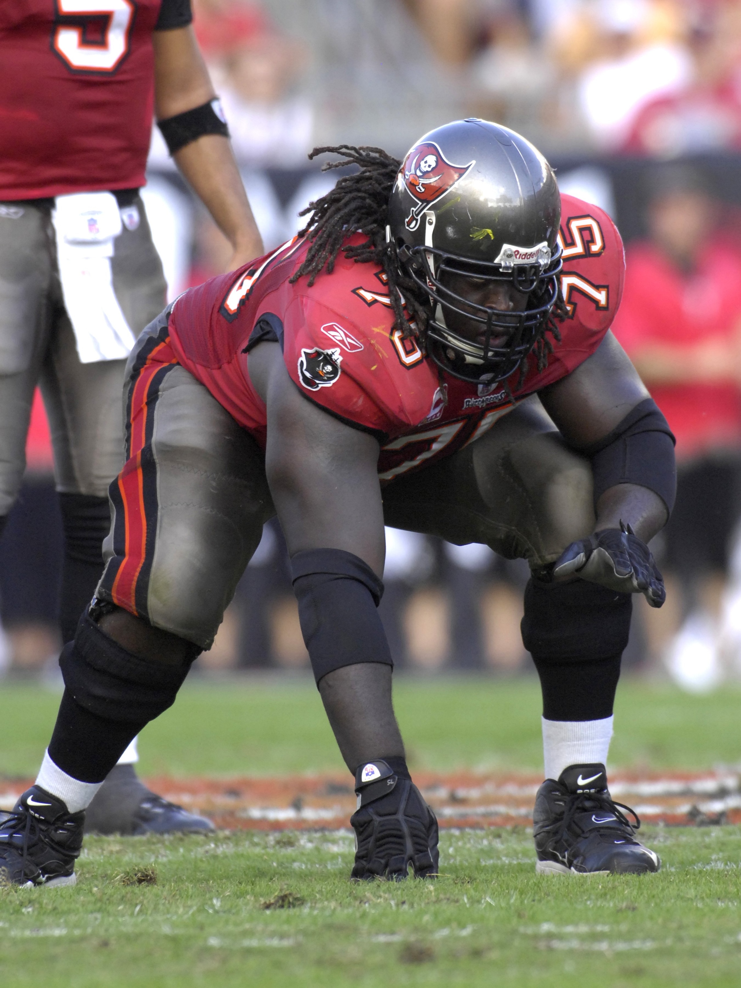 TAMPA, FL - NOVEMBER 25: Guard Davin Joseph #75 of the Tampa Bay Buccaneers sets for play against the Washington Redskins at the Raymond James Stadium on November 25, 2007 in Tampa, Florida. The Bucs won 19-13.  (Photo by Al Messerschmidt/Getty Images)