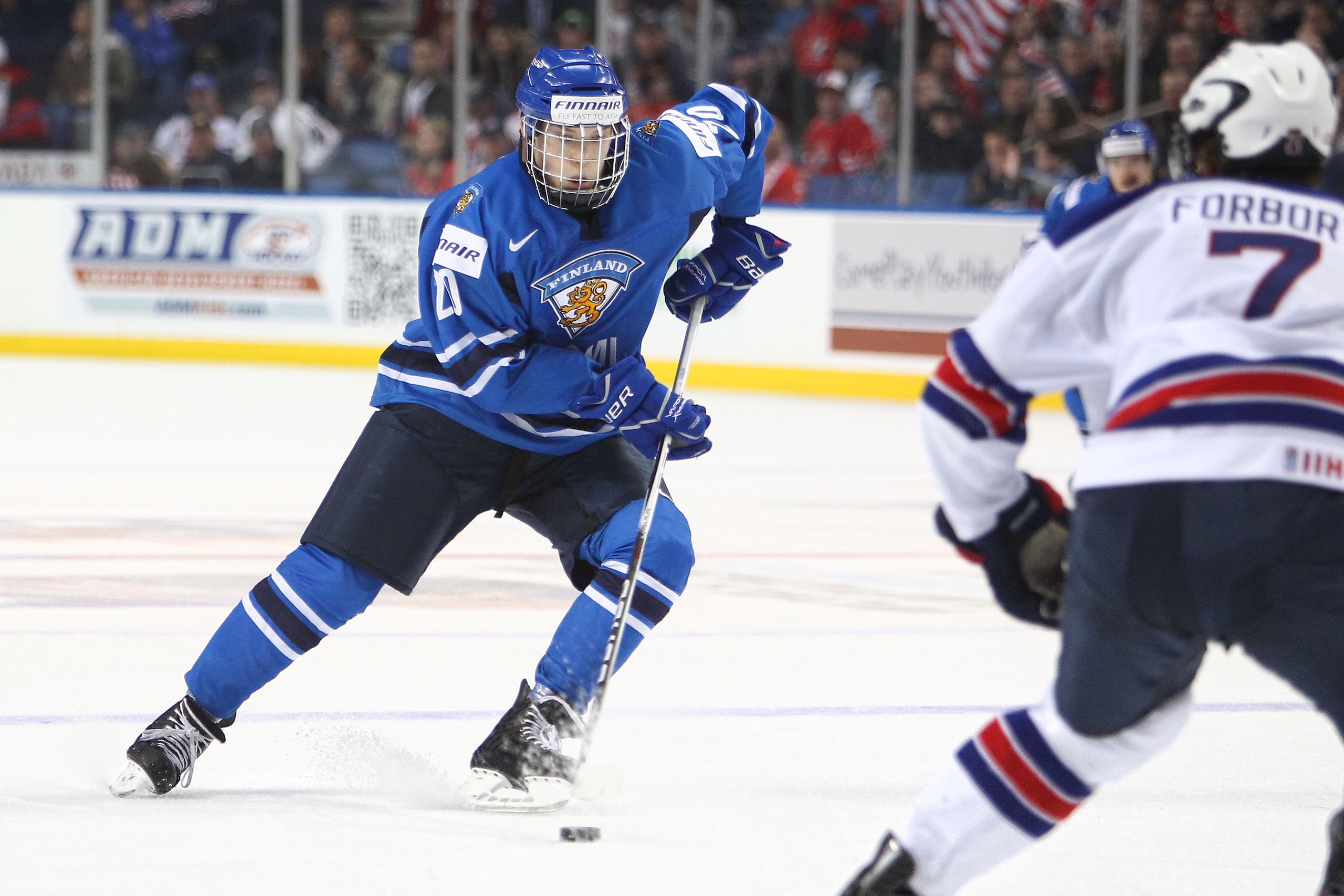 BUFFALO, NY - DECEMBER 26:  Joel Armia #20 of Finland carries the puck during the 2011 IIHF World U20 Championship Group A game between USA and Finland on December 26, 2010 at HSBC Arena in Buffalo, New York. (Photo by Tom Szczerbowski/Getty Images)