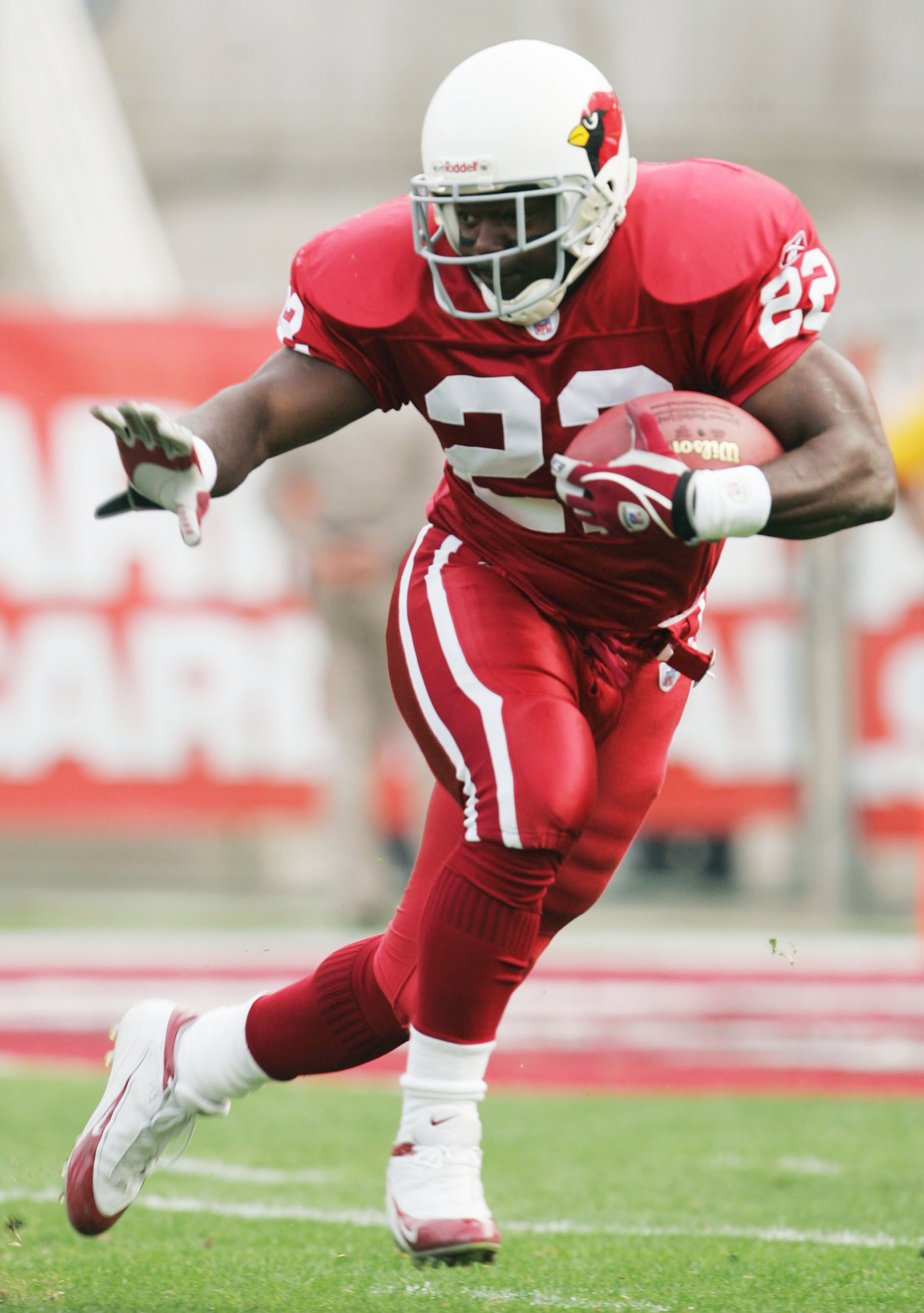 TEMPE, AZ - JANUARY 2:  Running back Emmitt Smith #22 of the Arizona Cardinals carries the ball against the Tampa Bay Buccaneers at Sun Devil Stadium on January 2, 2005 in Tempe, Arizona. The Cardinals defeated the Buccaneers 12-7. (Photo by Jeff Gross/Ge