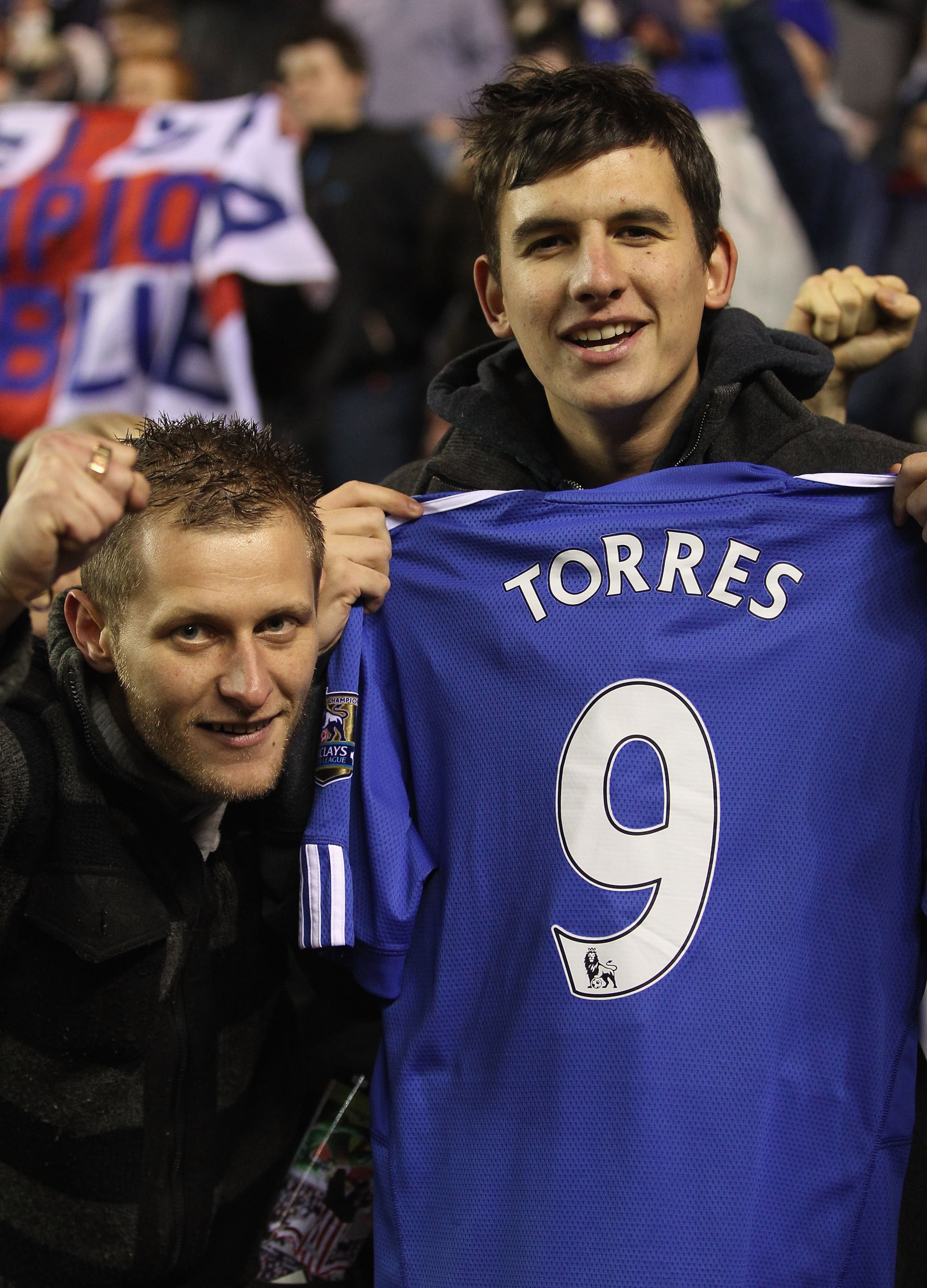 SUNDERLAND, ENGLAND - FEBRUARY 01:  Chelsea fans with a replica Fernando Torres shirt during the Barclays Premier League match between Sunderland and Chelsea at the Stadium of Light on February 1, 2011 in Sunderland, England.  (Photo by Scott Heavey/Getty