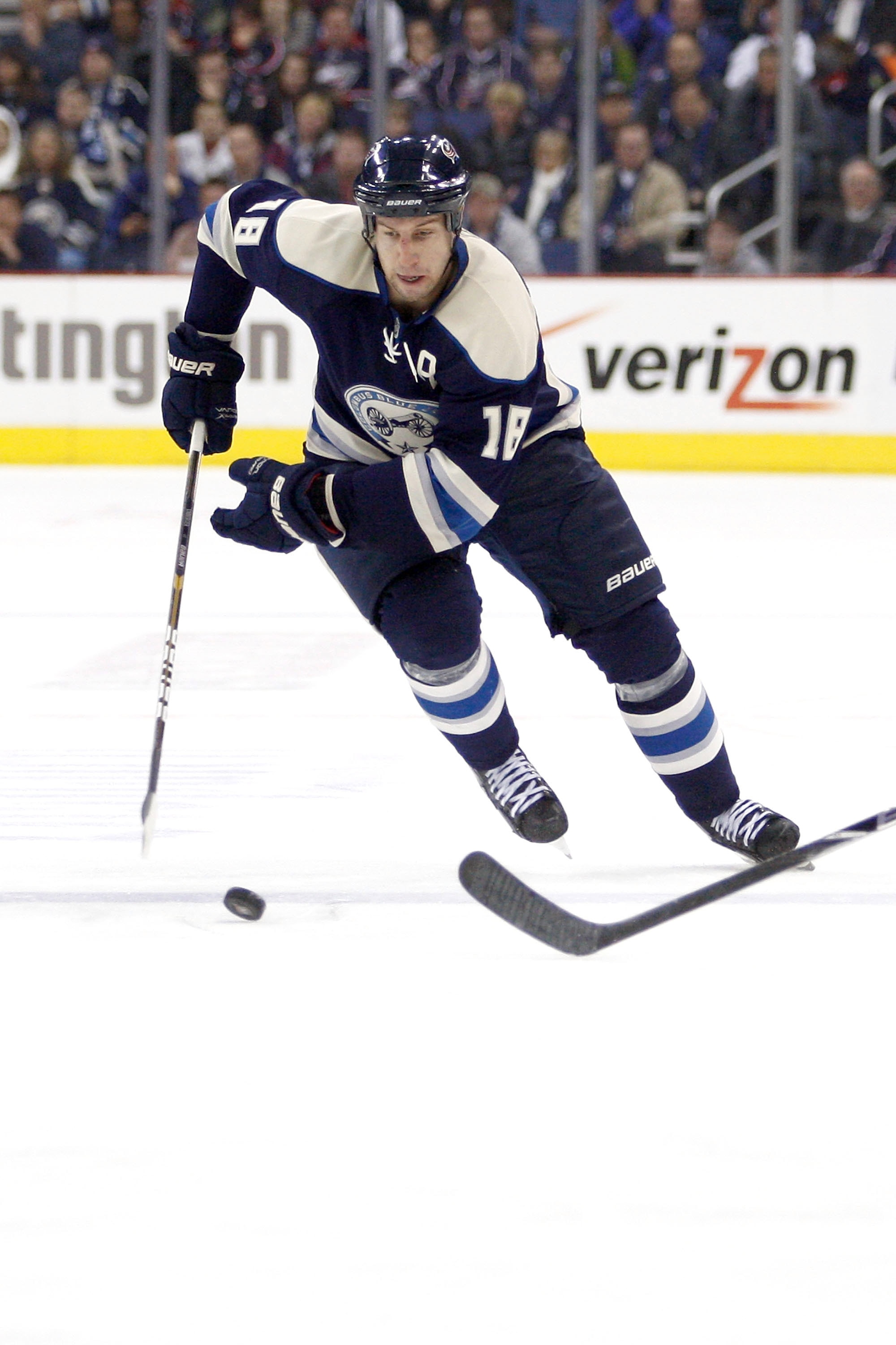 COLUMBUS, OH - JANUARY 14:  R.J. Umberger #18 of the Columbus Blue Jackets skates the puck up ice during a game against the Detroit Red Wings on January 14, 2011 at Nationwide Arena in Columbus, Ohio. (Photo by John Grieshop/Getty Images)