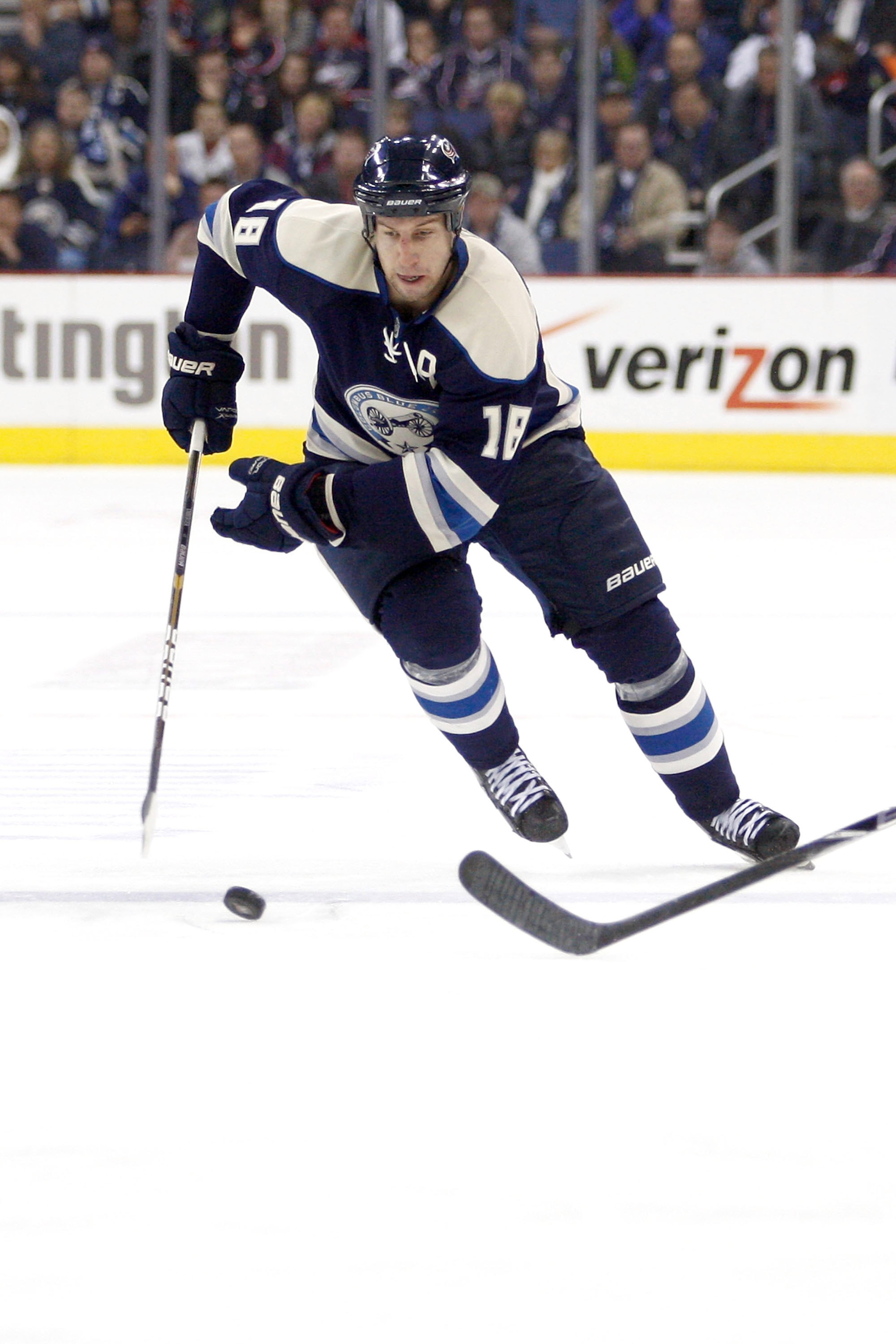 COLUMBUS, OH - JANUARY 14:  R.J. Umberger #18 of the Columbus Blue Jackets skates the puck up ice during a game against the Detroit Red Wings on January 14, 2011 at Nationwide Arena in Columbus, Ohio. (Photo by John Grieshop/Getty Images)