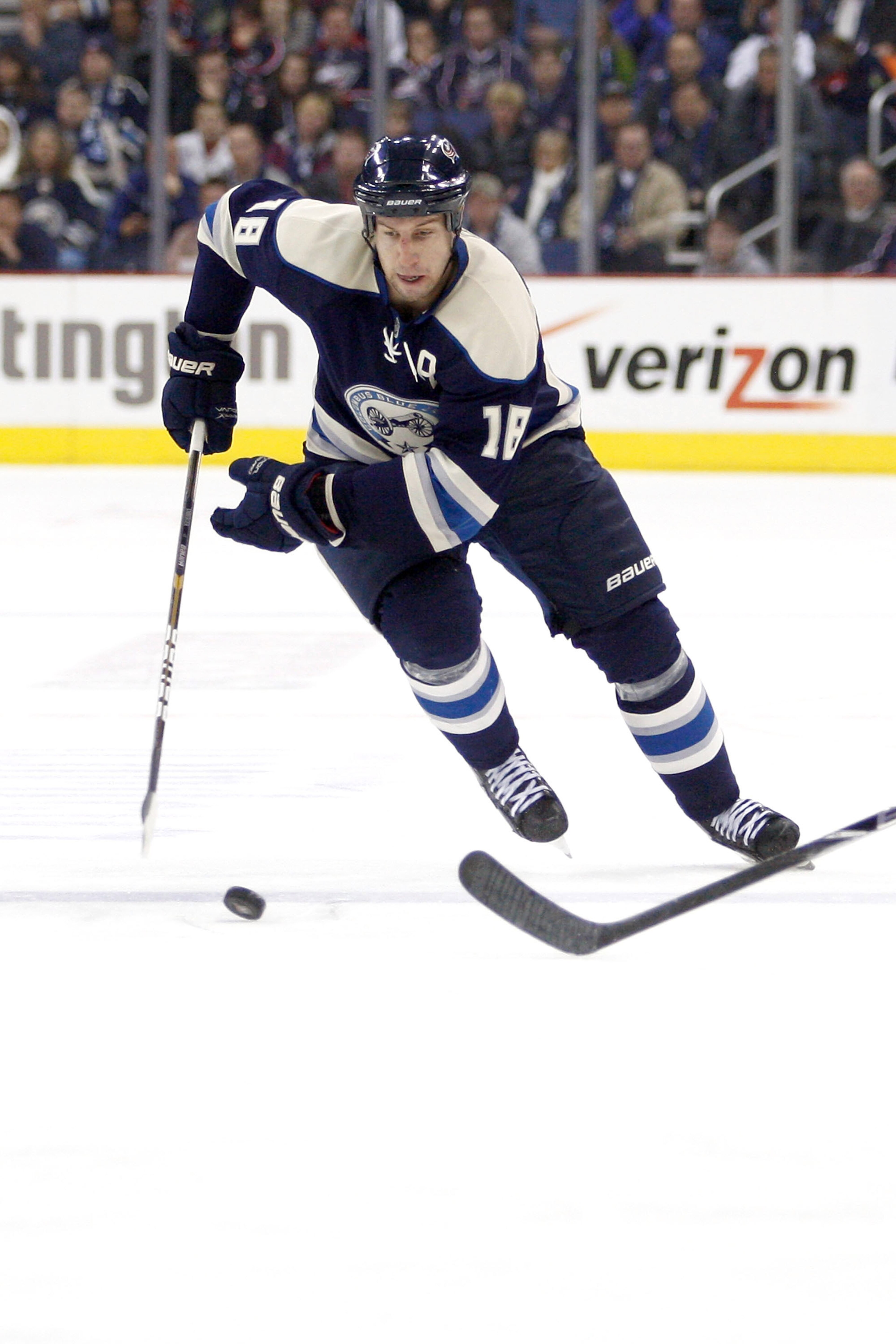 COLUMBUS, OH - JANUARY 14:  R.J. Umberger #18 of the Columbus Blue Jackets skates the puck up ice during a game against the Detroit Red Wings on January 14, 2011 at Nationwide Arena in Columbus, Ohio. (Photo by John Grieshop/Getty Images)