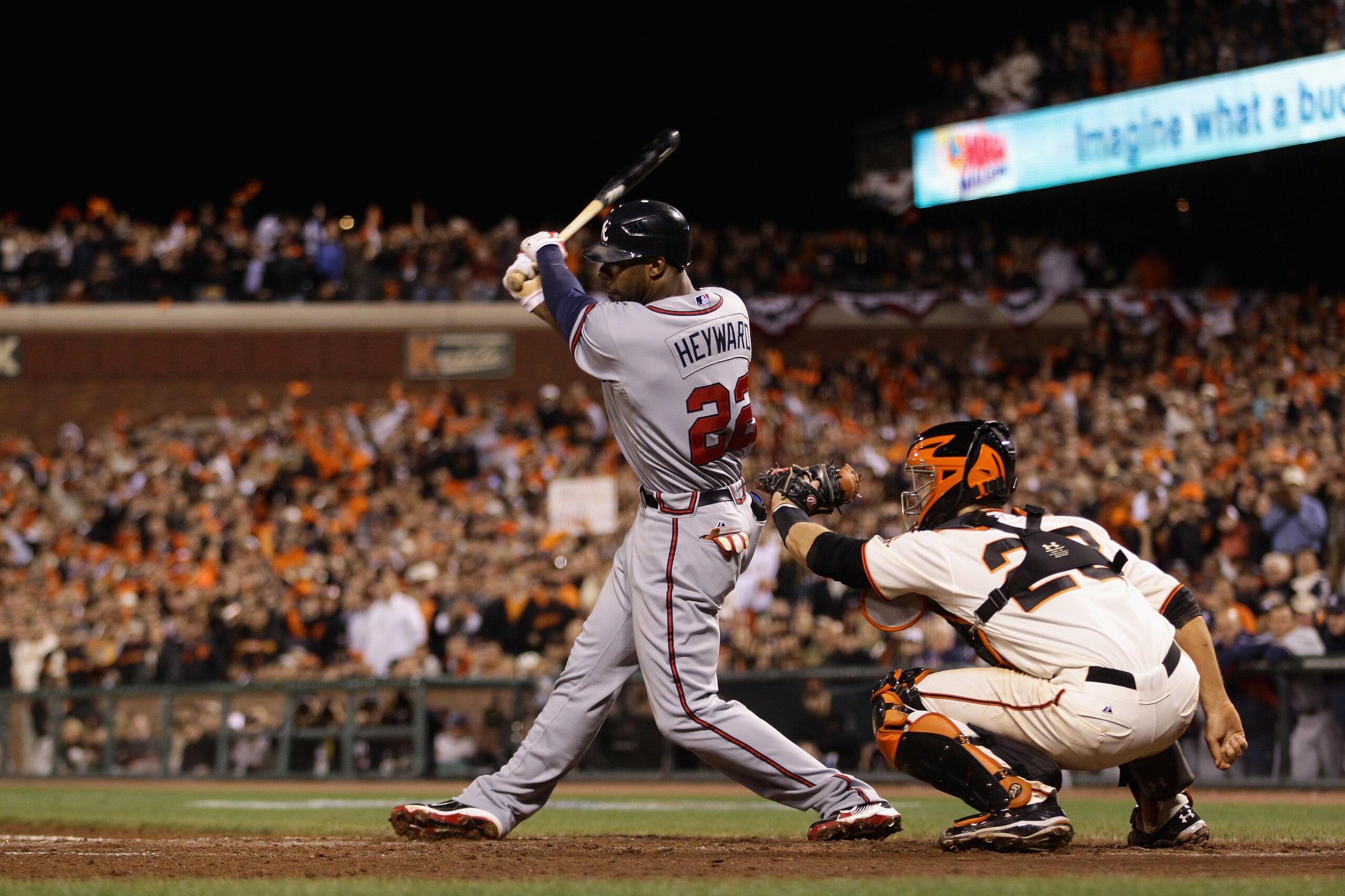 SAN FRANCISCO - OCTOBER 07:  Jason Heyward #22 of the Atlanta Braves strikes out to end the sixth inning with Buster Posey #28 playing catcher for the San Francisco Giants during game 1 of the NLDS at AT&T Park on October 7, 2010 in San Francisco, Califor