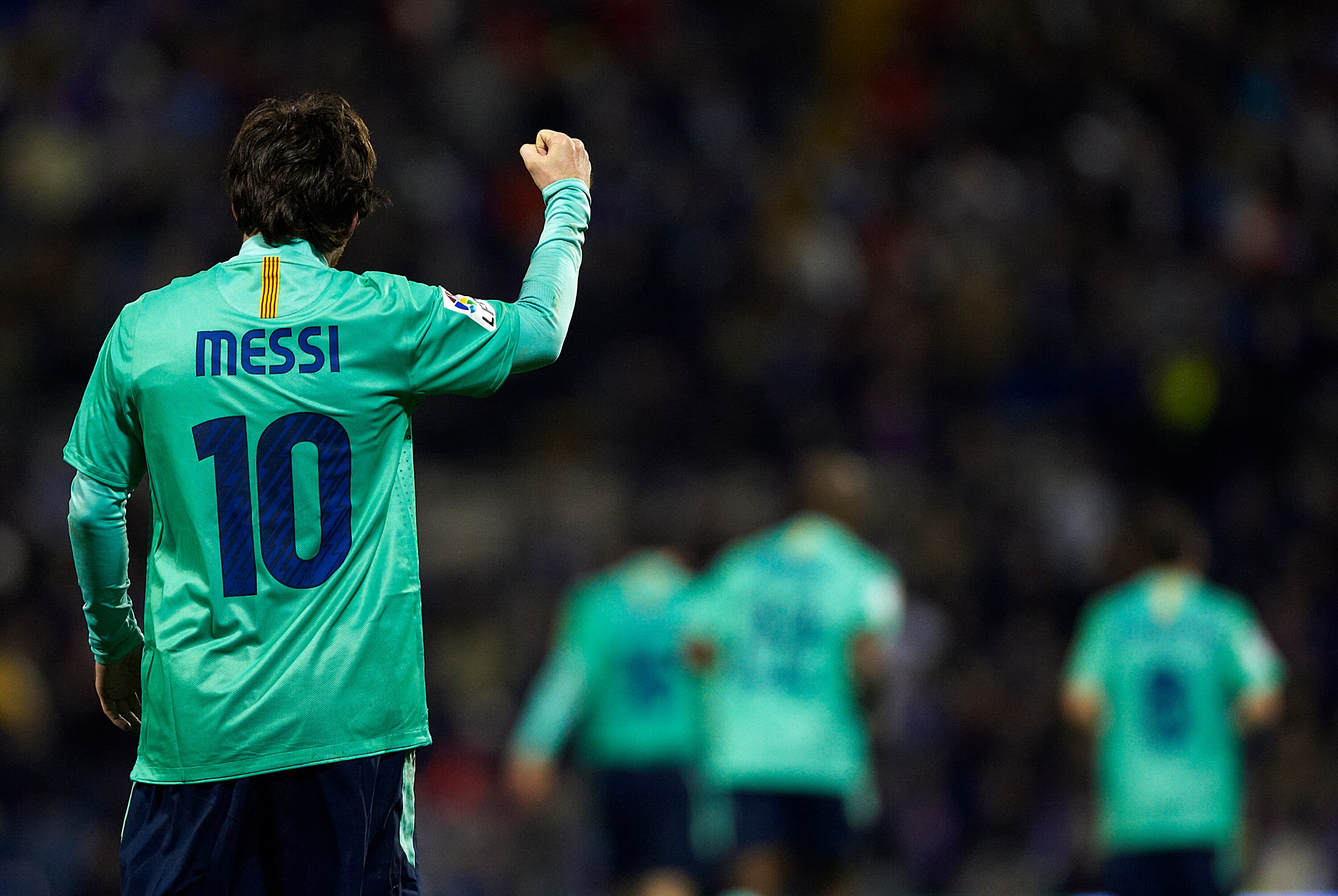 ALICANTE, SPAIN - JANUARY 29:  Lionel Messi of Barcelona celebrates after scoring during the la Liga match between Hercules and Barcelona at Estadio Jose Rico Perez on January 29, 2011 in Alicante, Spain.  Barcelona won 0-3.  (Photo by Manuel Queimadelos 