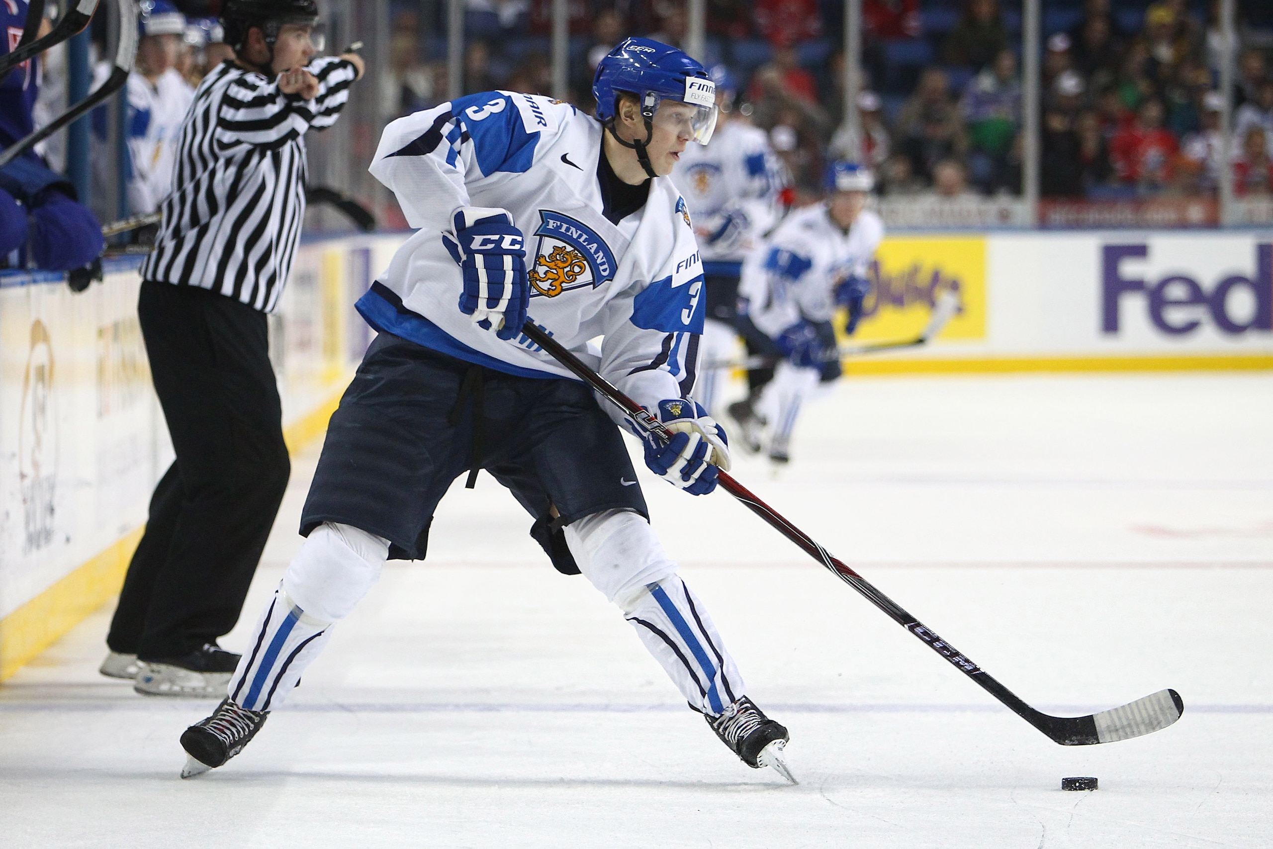 BUFFALO, NY - DECEMBER 31: Defenseman Jyrki Jokipakka #3 of Finland carries the puck during the 2011 IIHF World U20 Championship game between Slovakia and Finland on December 31, 2010 at HSBC Arena in Buffalo, New York. (Photo by Tom Szczerbowski/Getty Im