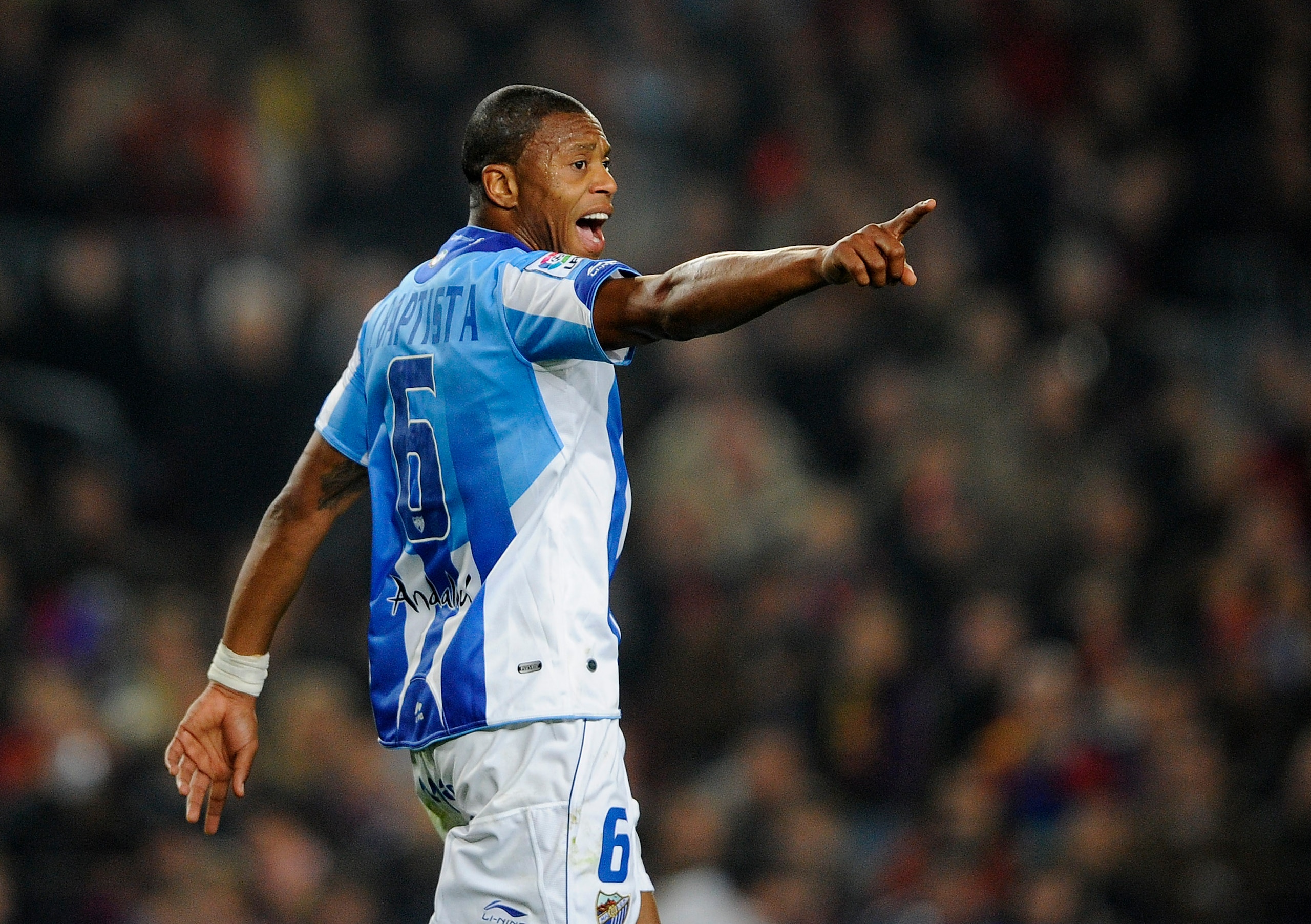BARCELONA, SPAIN - JANUARY 16:  Julio Baptista of Malaga reacts during the La Liga match between FC Barcelona and Malaga at Nou Camp on January 16, 2011 in Barcelona, Spain. Barcelona won 4-1.  (Photo by David Ramos/Getty Images)