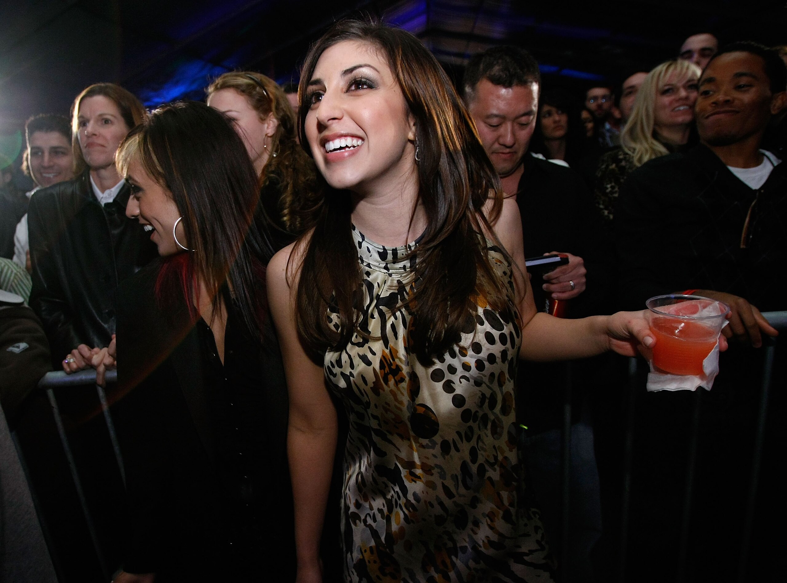 PHOENIX - JANUARY 31:  Fans dance to rapper Ludacris during the 'Best Damn Super Bowl Party Period' at the Rockridge Estate on January 31, 2008 in Phoenix, Arizona.  (Photo by Michael Buckner/Getty Images for HollyRod Foundation)