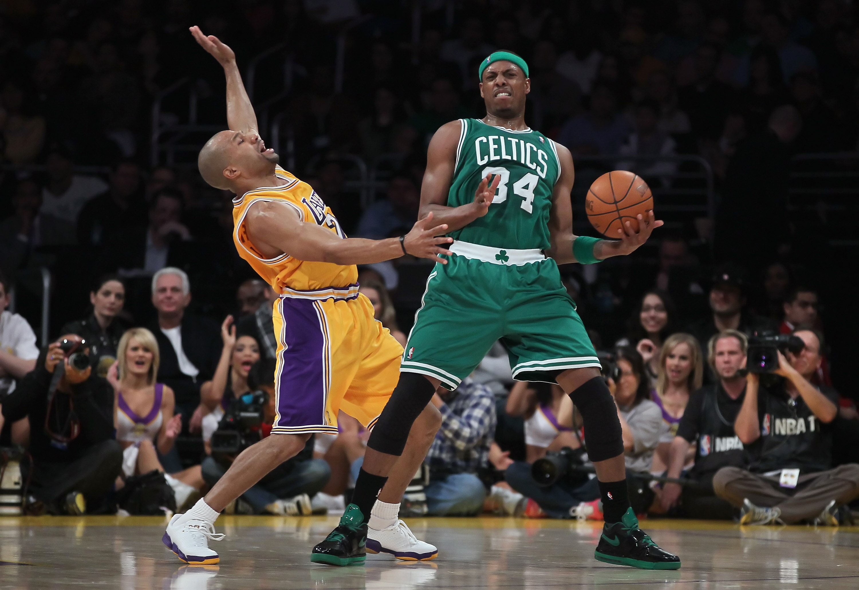 LOS ANGELES, CA - JANUARY 30:  Paul Pierce #34 of the Boston Celtics is defended by Derek Fisher #2 of the Los Angeles Lakers in the first half at Staples Center on January 30, 2011 in Los Angeles, California. The Celtics defeated the Lakers 109-96.  (Pho