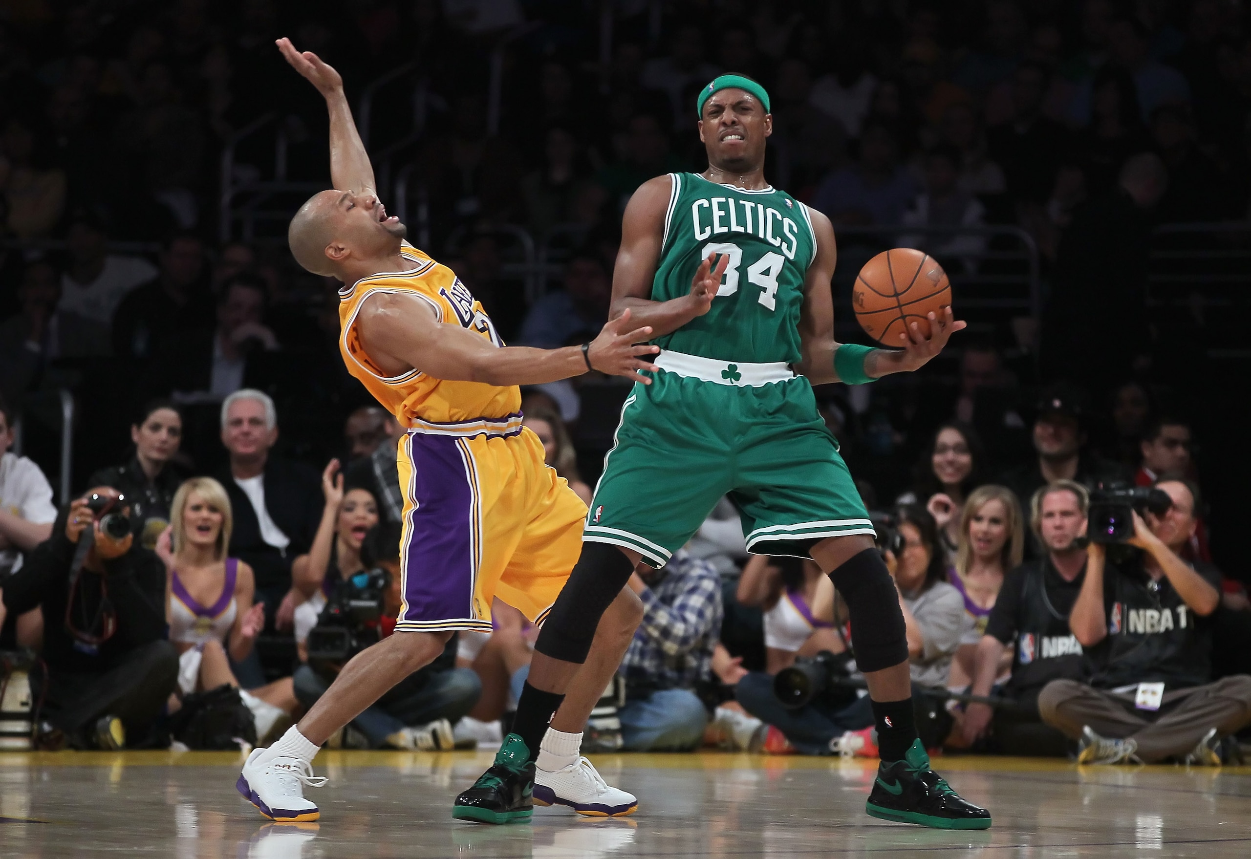 LOS ANGELES, CA - JANUARY 30:  Paul Pierce #34 of the Boston Celtics is defended by Derek Fisher #2 of the Los Angeles Lakers in the first half at Staples Center on January 30, 2011 in Los Angeles, California. The Celtics defeated the Lakers 109-96.  (Pho