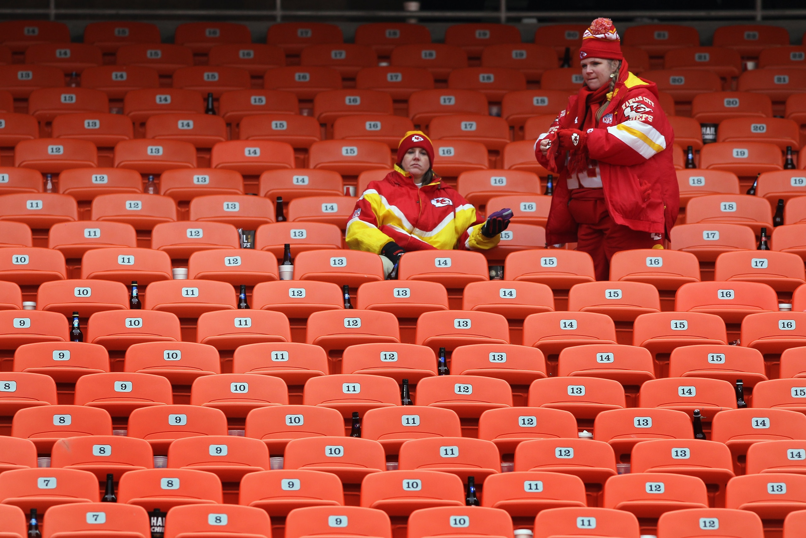 KANSAS CITY, MO - JANUARY 09:  Fans of the Kansas City Chiefs sit in the stands after the Baltimore Ravens defeated the Chiefs 30-7 in the 2011 AFC wild card playoff game at Arrowhead Stadium on January 9, 2011 in Kansas City, Missouri.  (Photo by Doug Pe